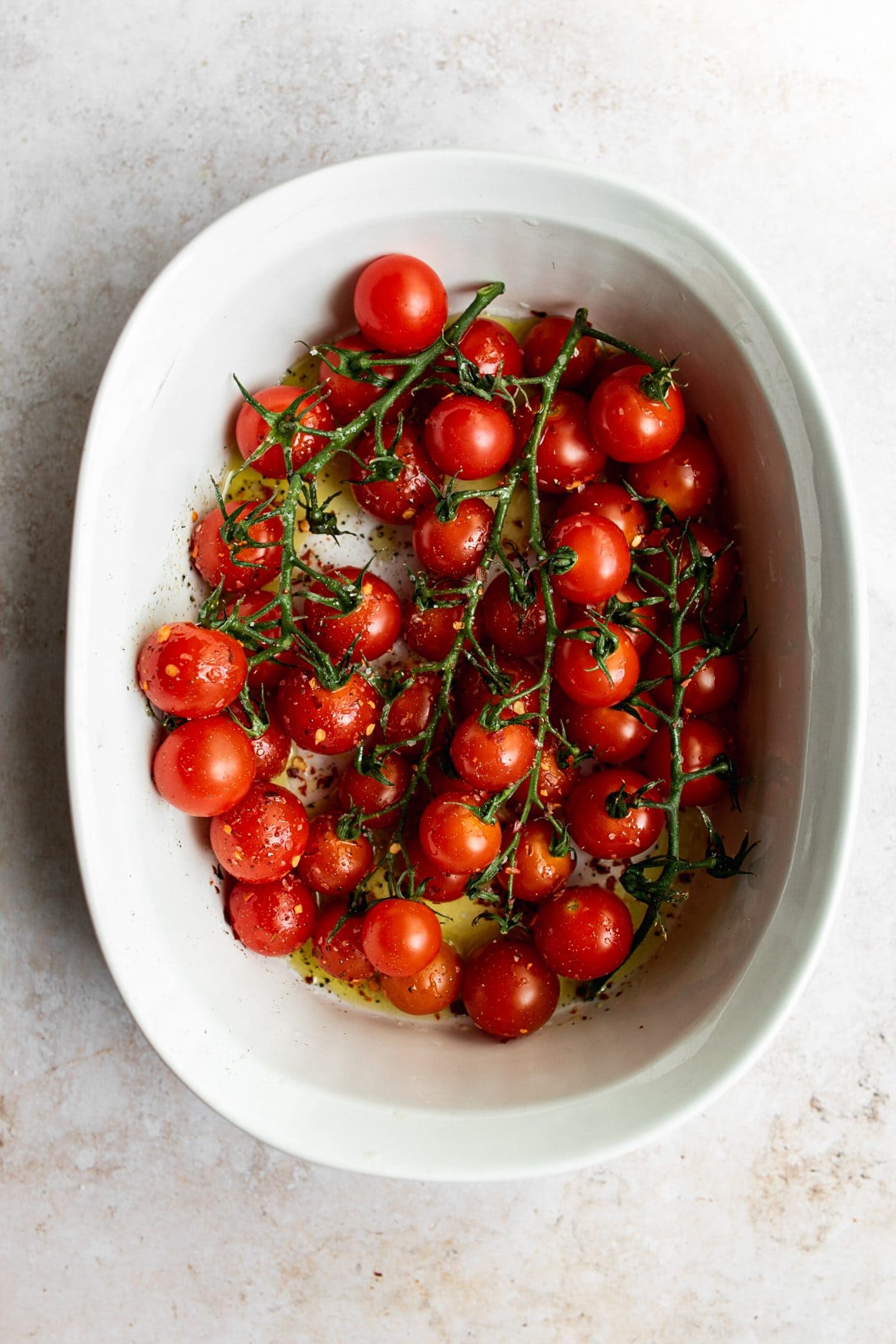 baby vine tomatoes in roasting pan