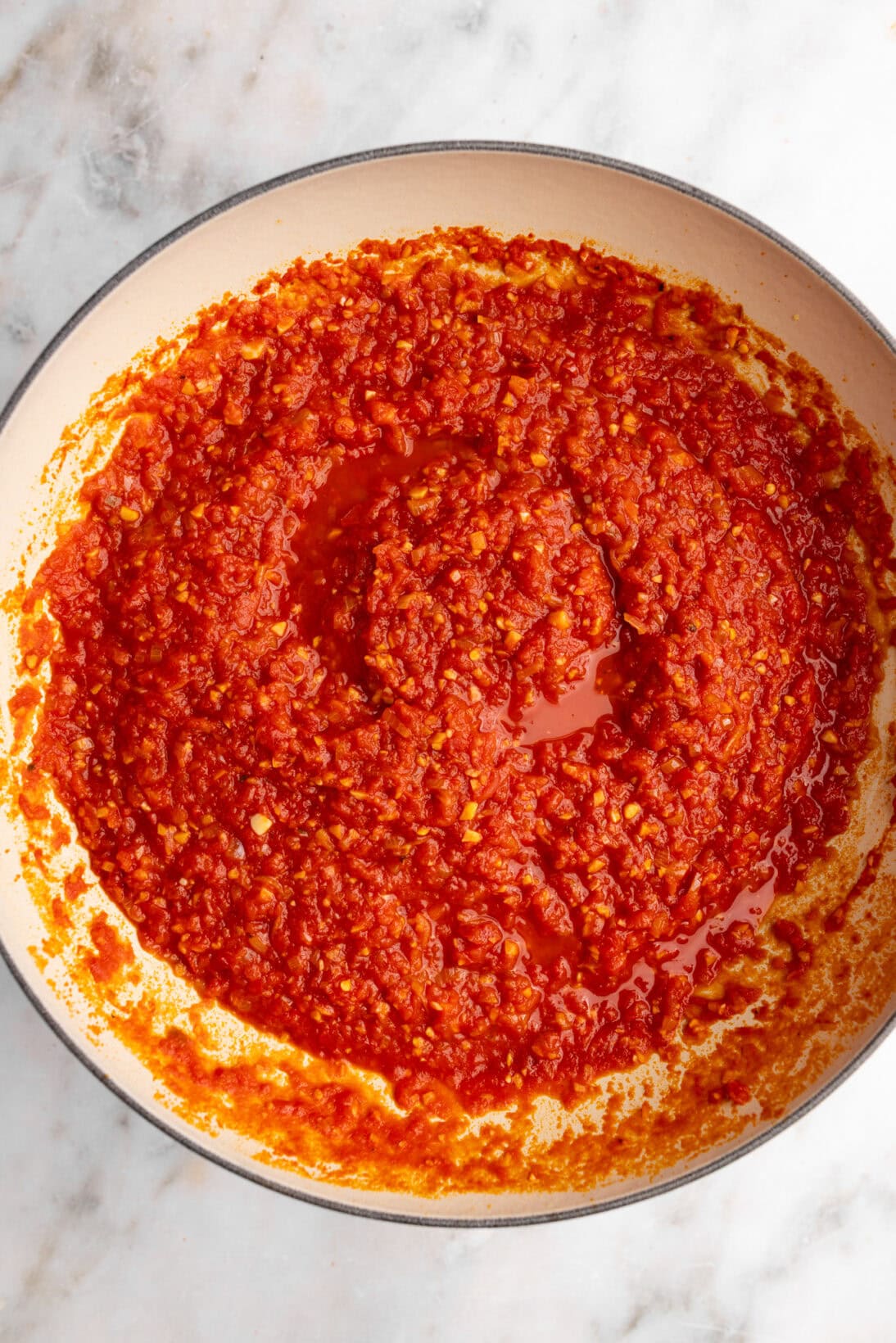 step by step: cooking the sauce with crushed tomatoes