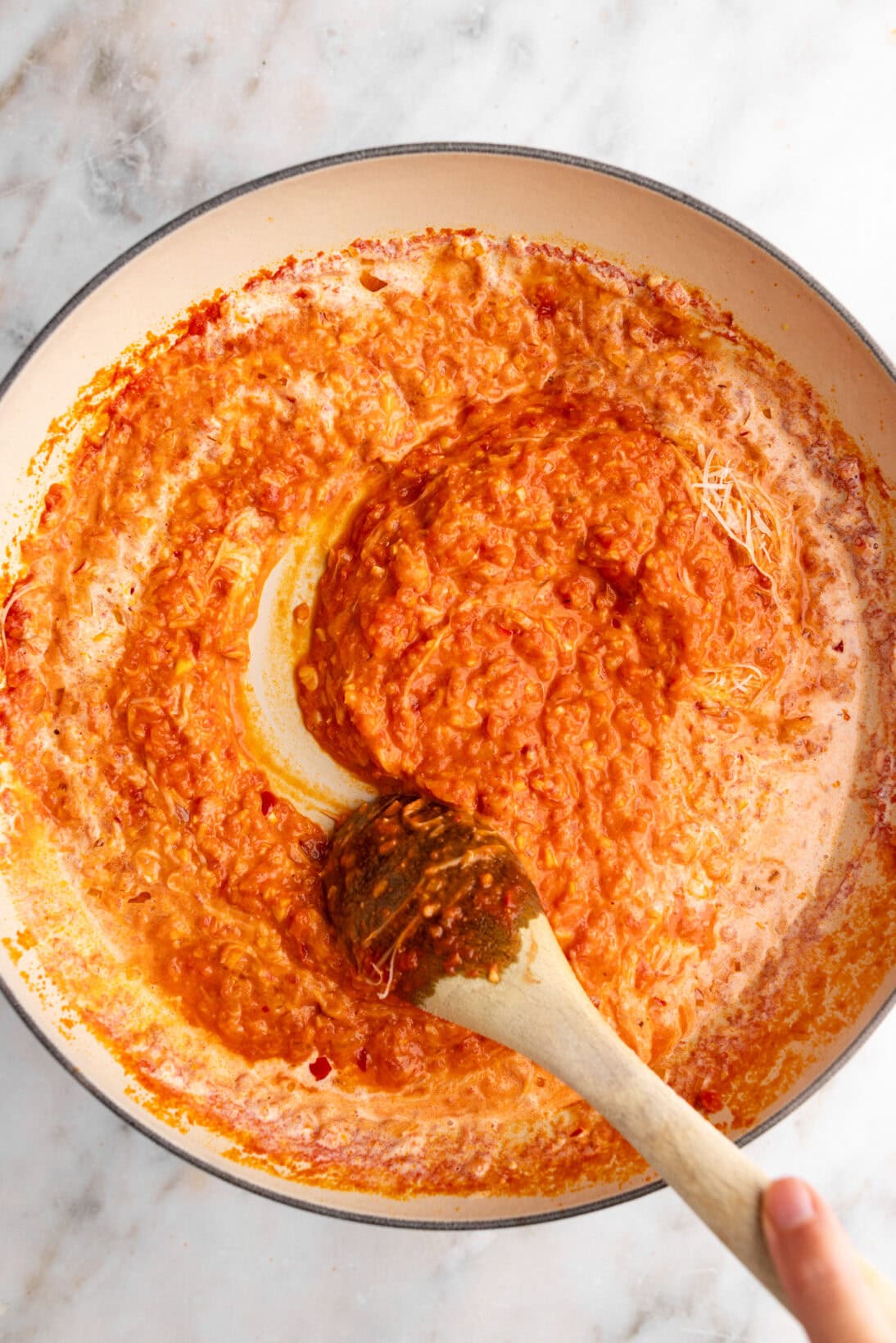 step by step: mixing in the heavy cream and parmesan cheese