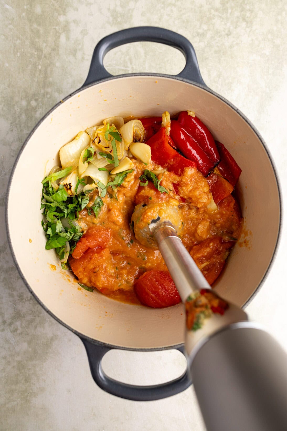 blending the ingredients with an immersion blender
