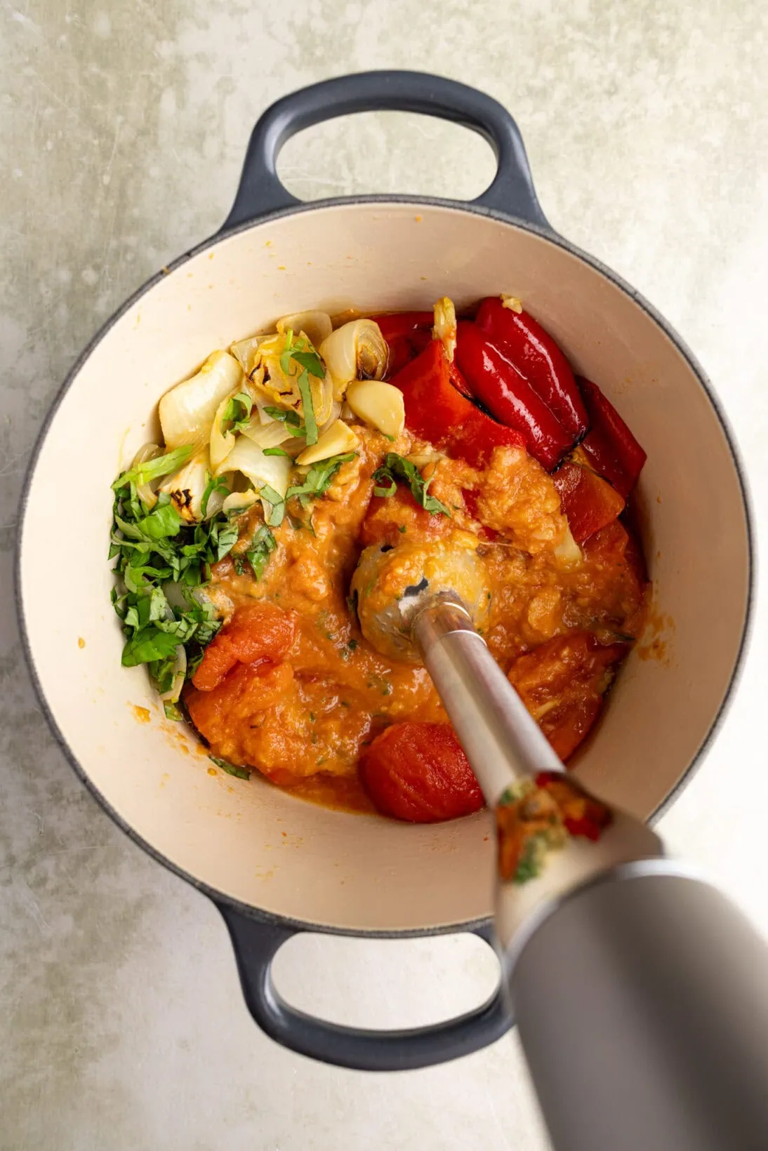 blending the ingredients with an immersion blender