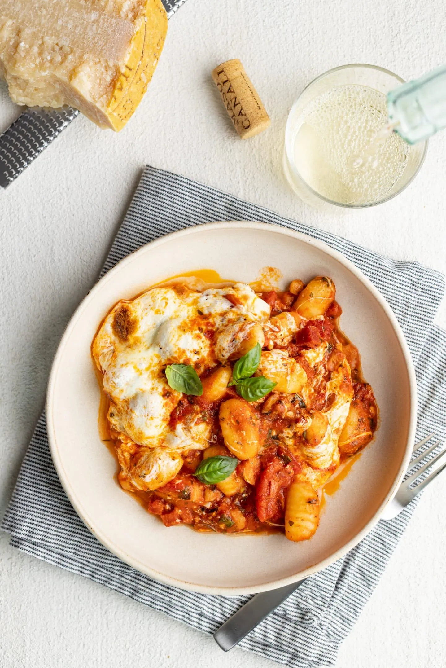 bowl of of pizza gnocchi bake with parm