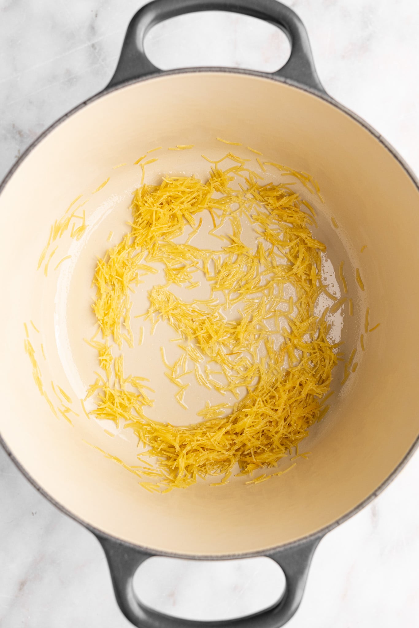 step by step: toasting the vermicelli, golden, uncooked