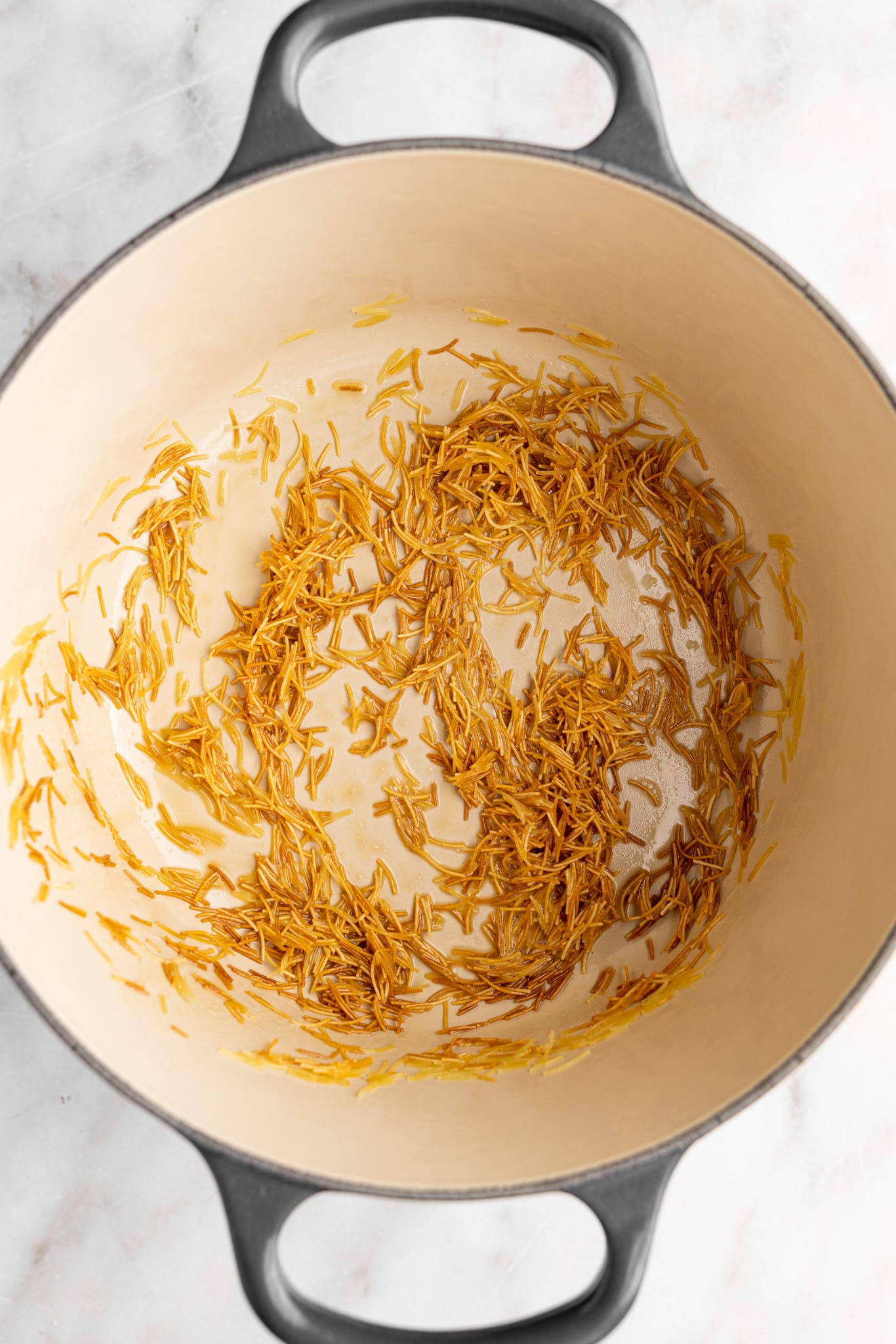 step by step: toasting the vermicelli, brown