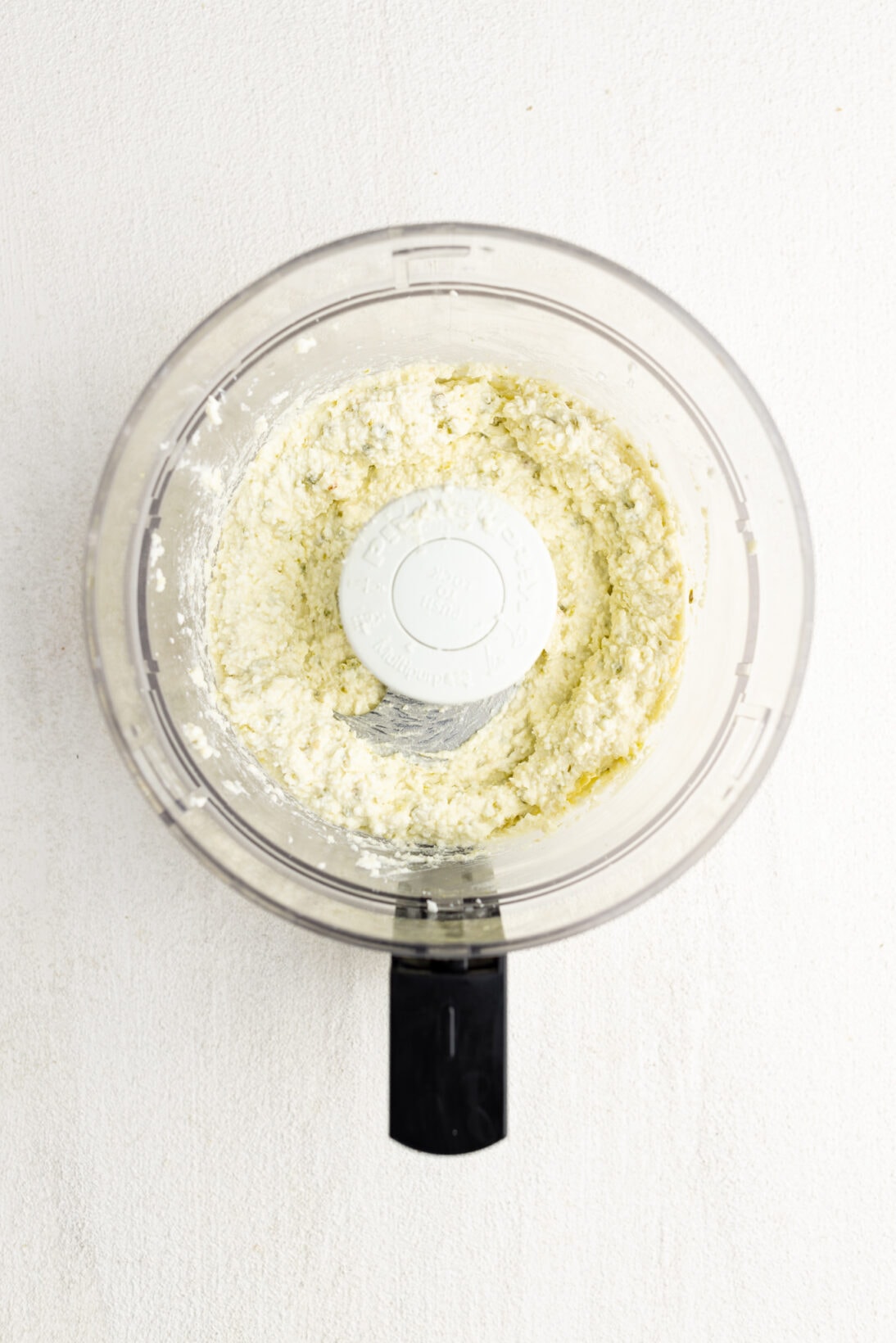 food processor with processed crazy feta dip