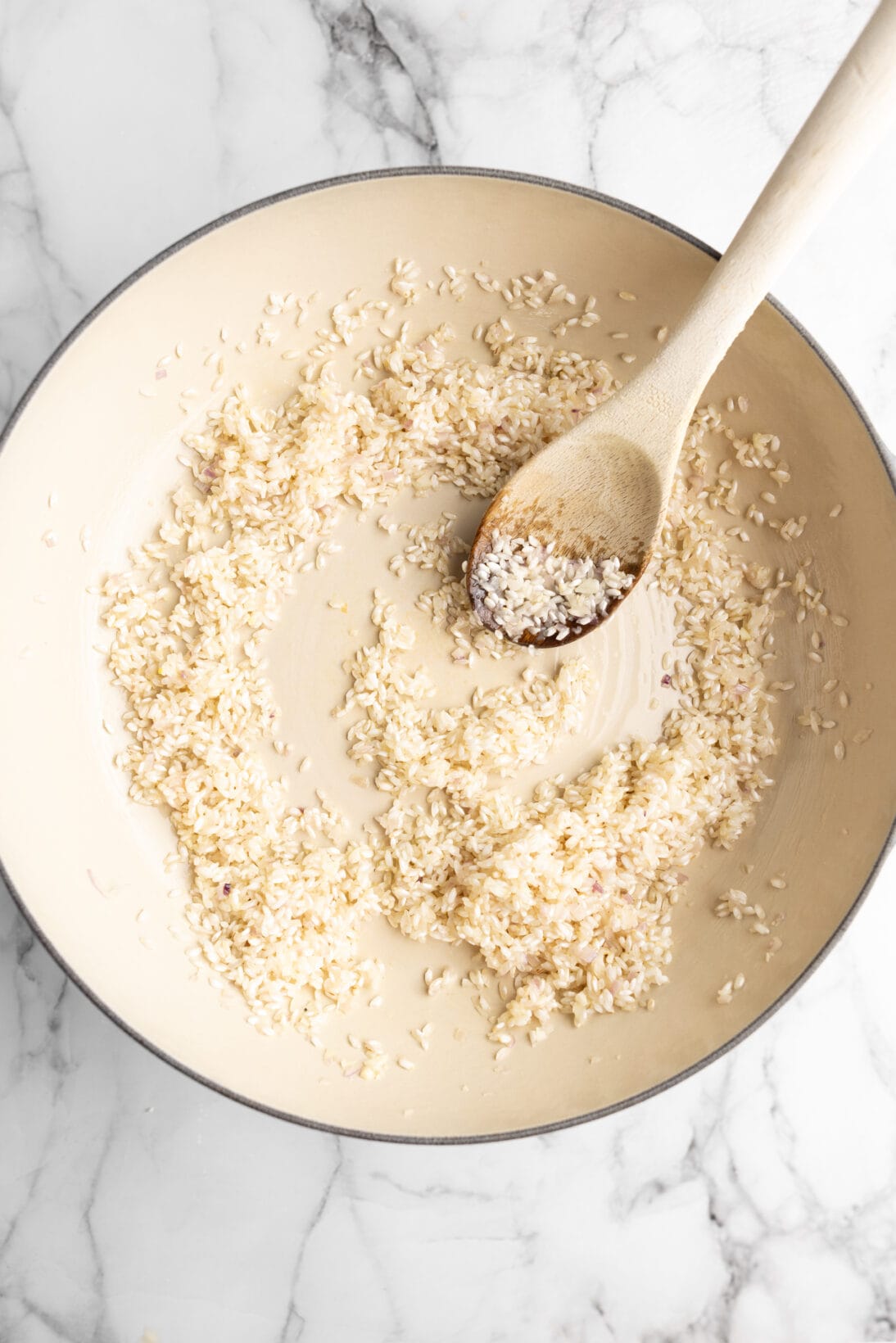 toasting the risotto rice