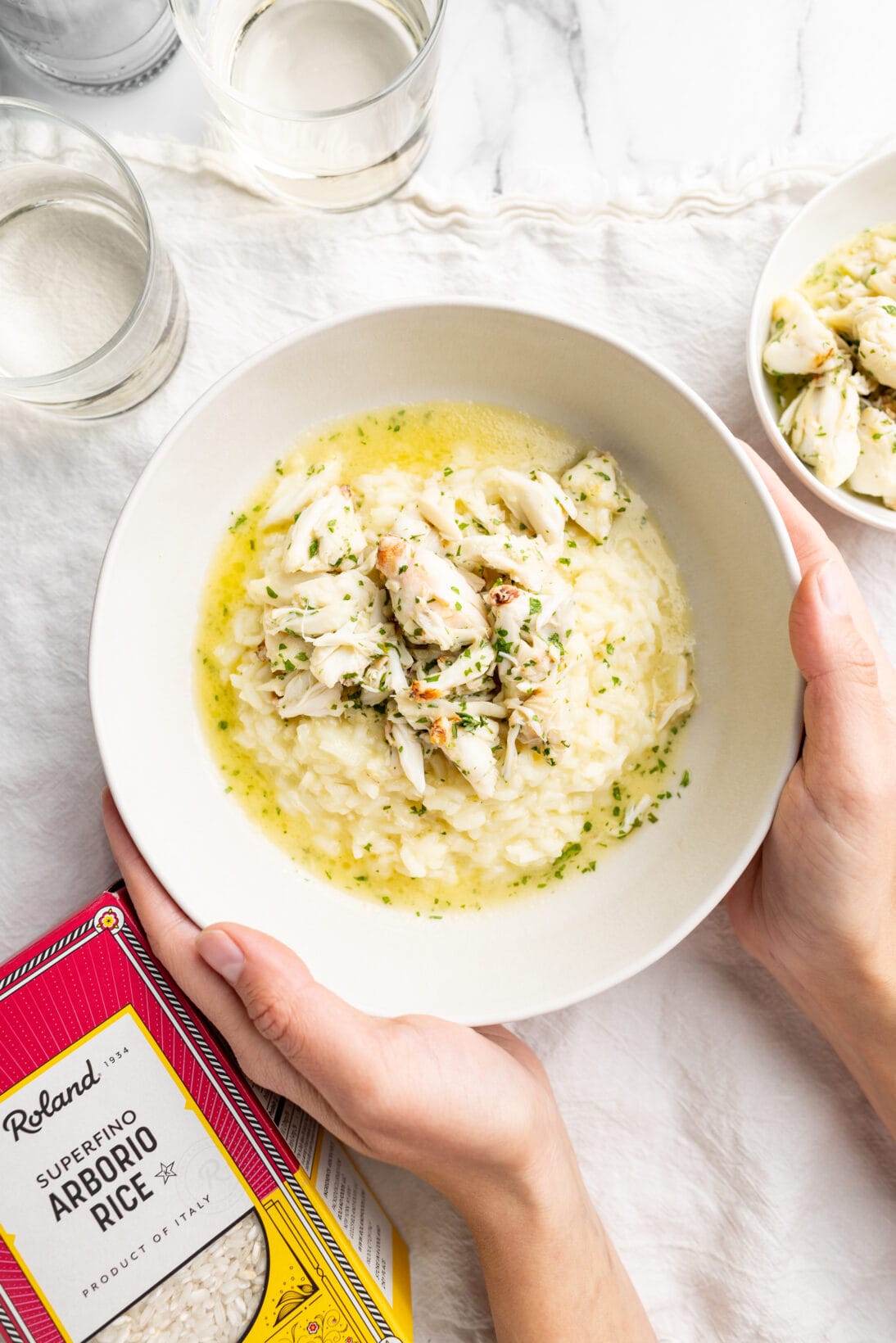 Crab risotto topped with a garlic and white wine sauce