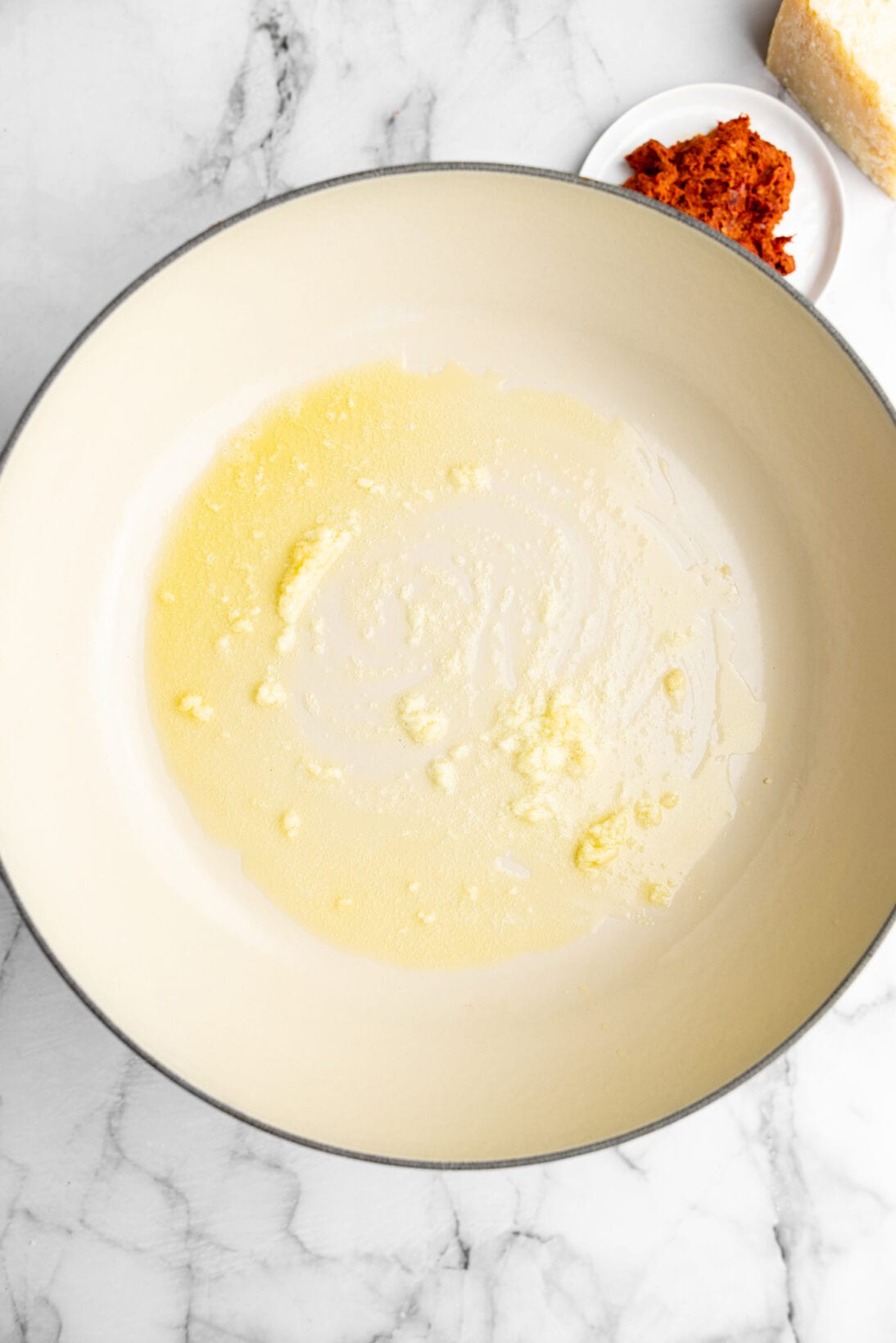 sautéing the garlic in the butter