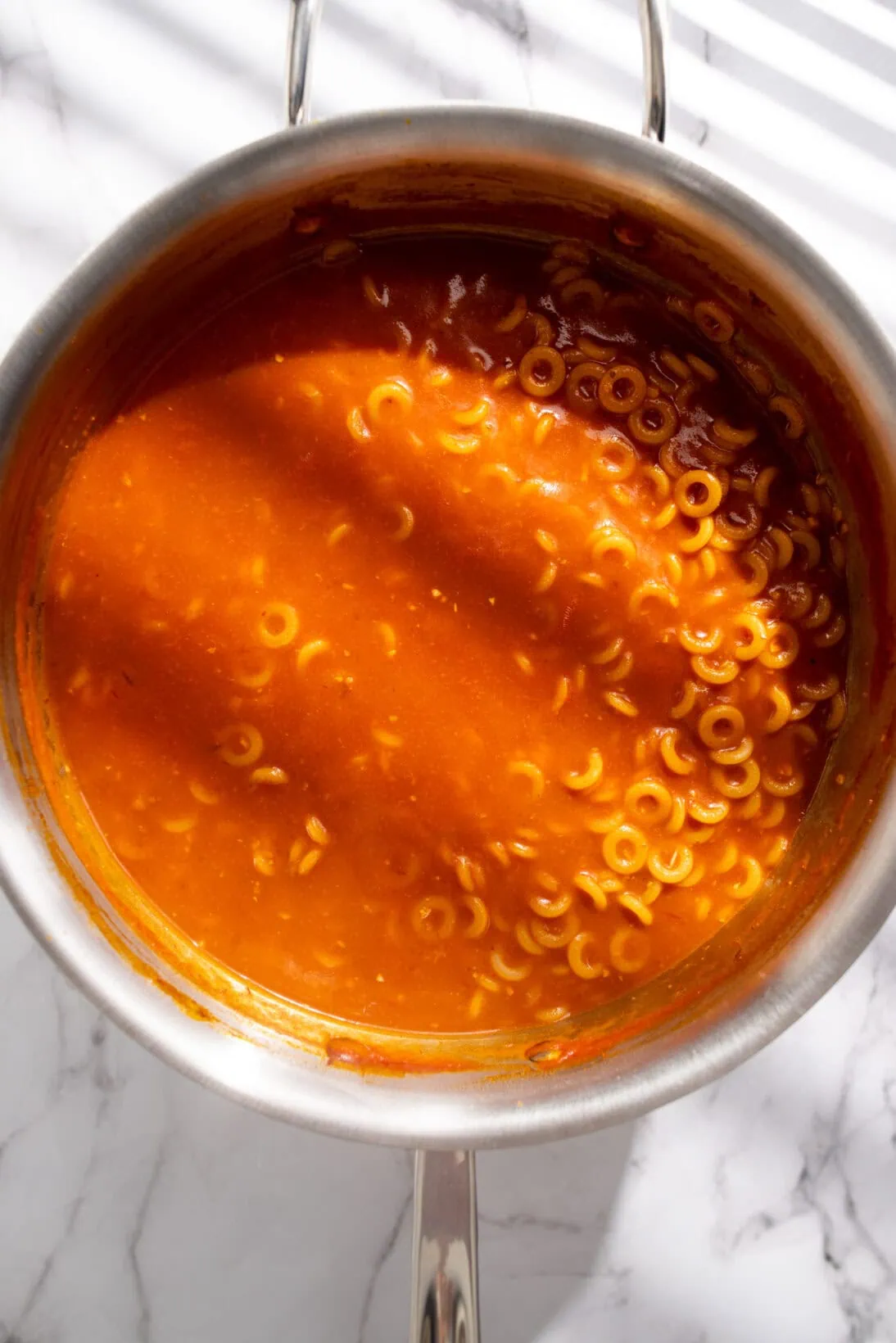cooking the spicy chipotle homemade spaghettios.