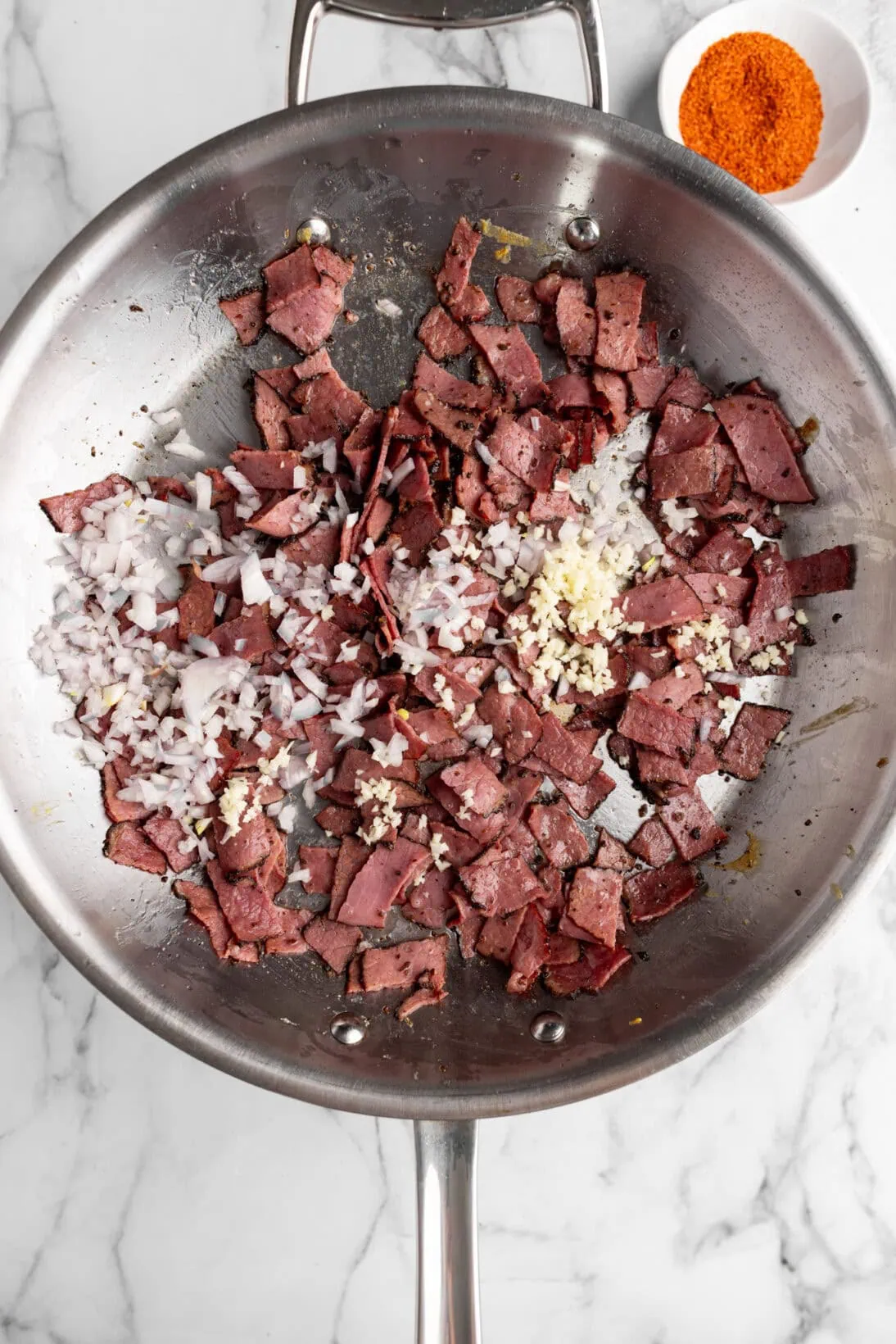 step by step photos: added shallot and garlic to the pastrami