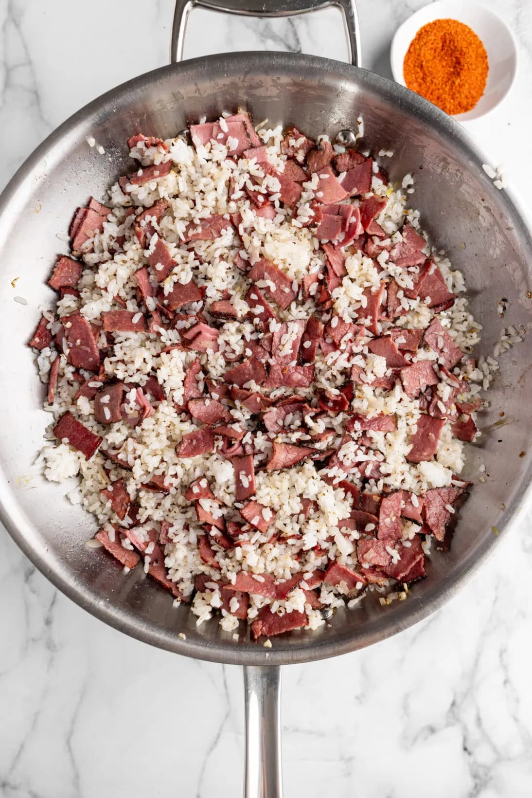 step by step photos: frying the pastrami fried rice