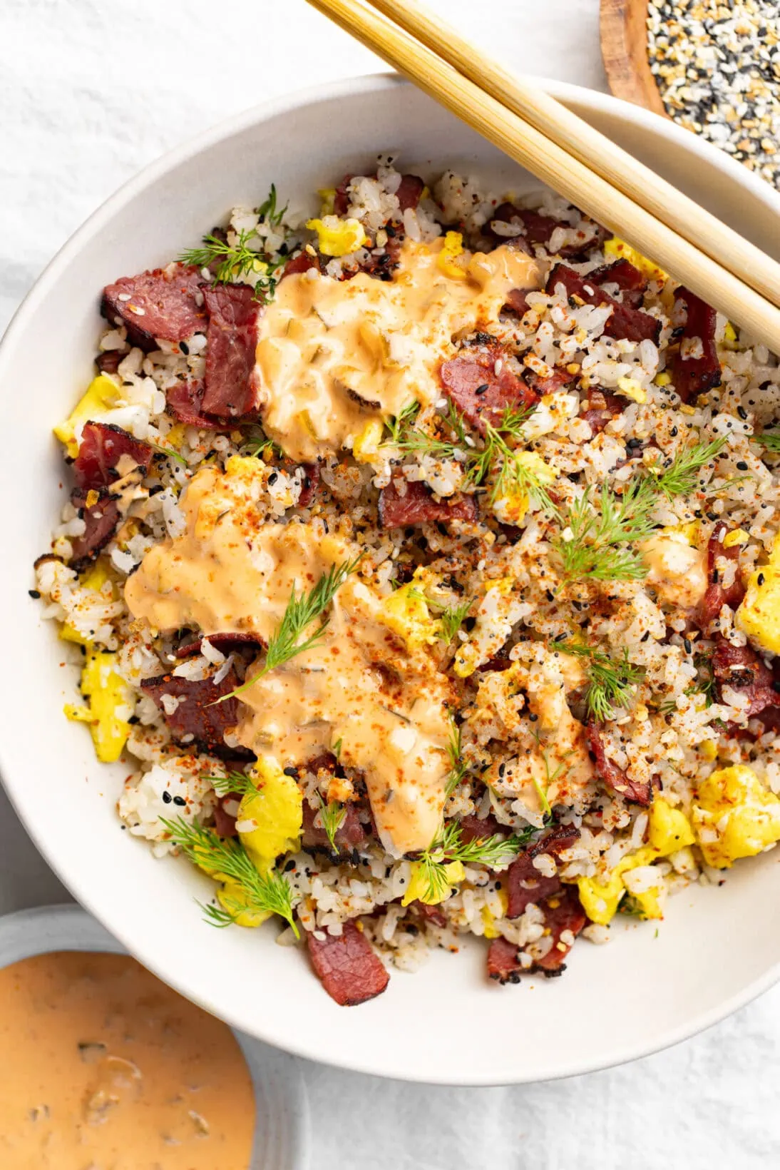 pastrami fried rice topped with sriracha Russian dressing