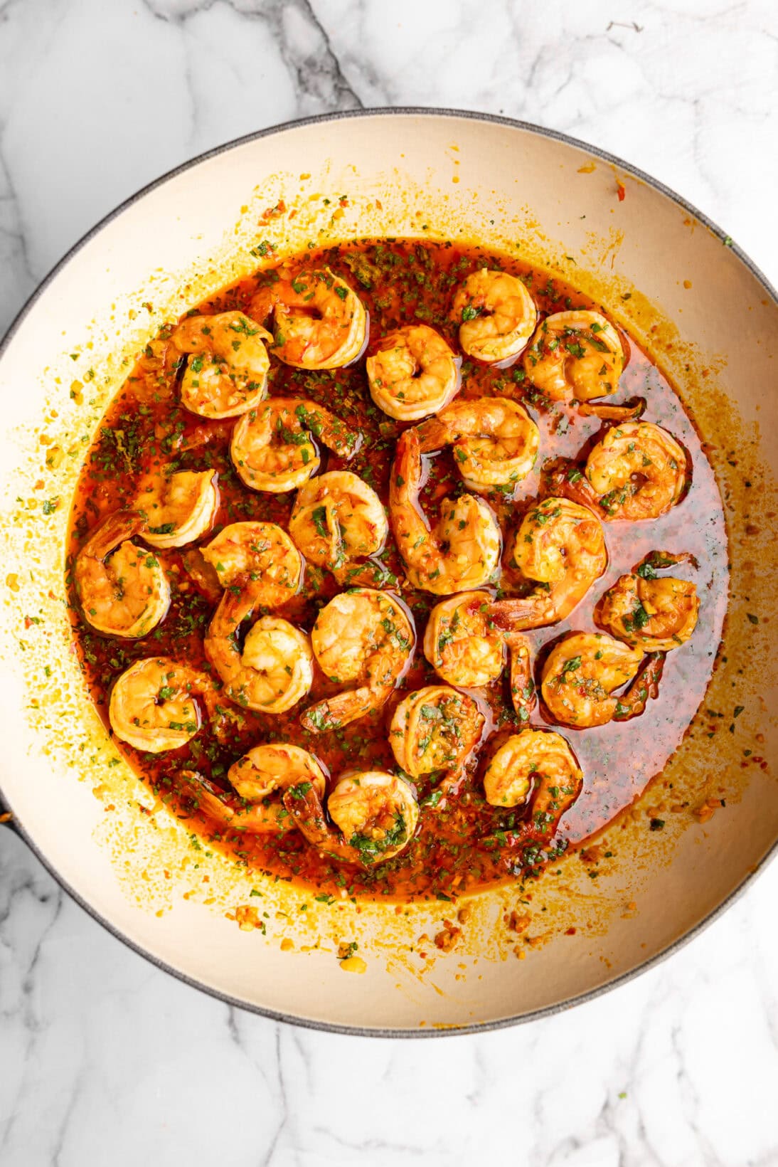 shrimp simmering in the sauce