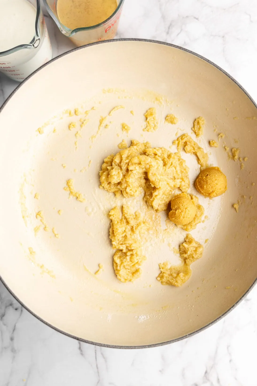 step my step process: added flour to make a roux and added the miss ( not mixed in yet)