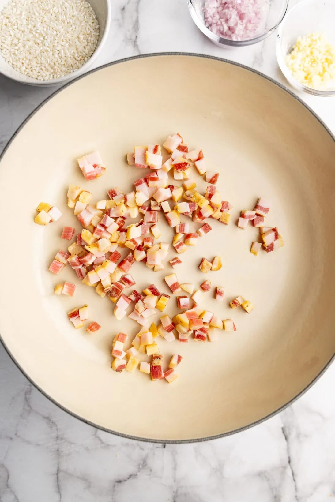making the risotto: rendering down the guanciale