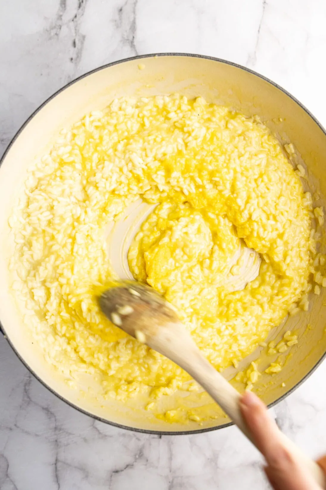 making the risotto: the risotto once the egg and cheese paste has been added in.