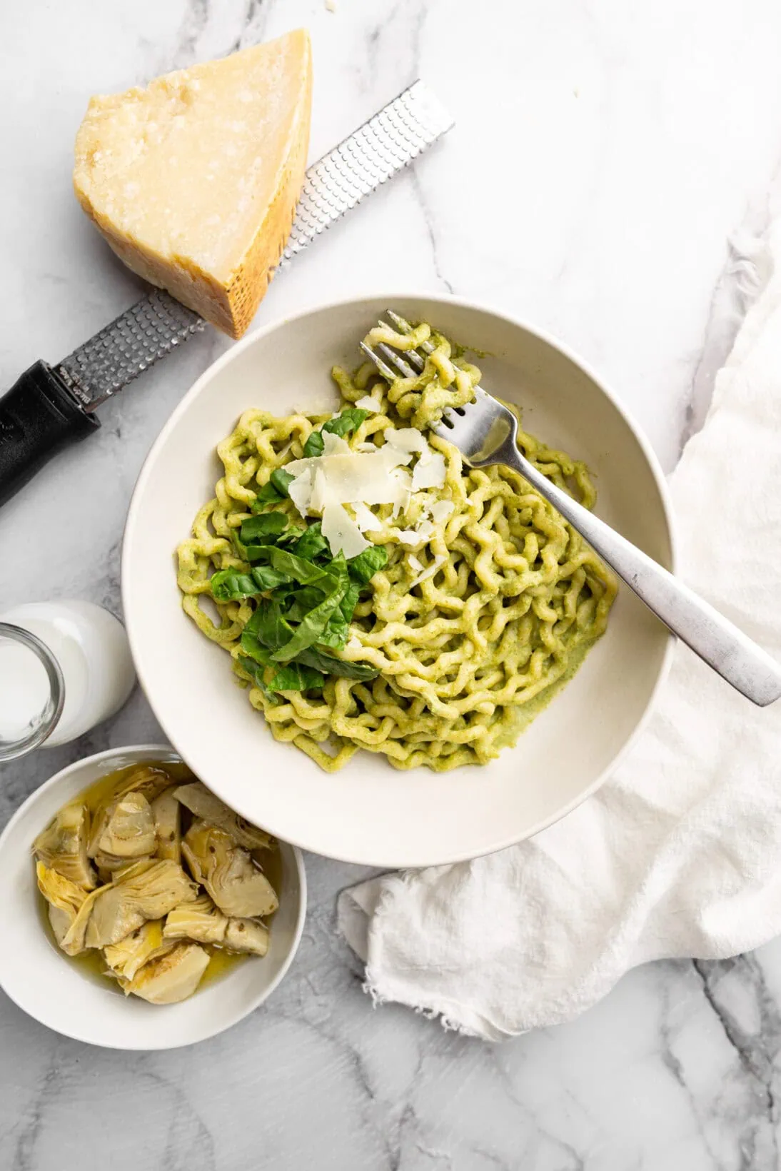 a bowl of artichoke and spinach pasta