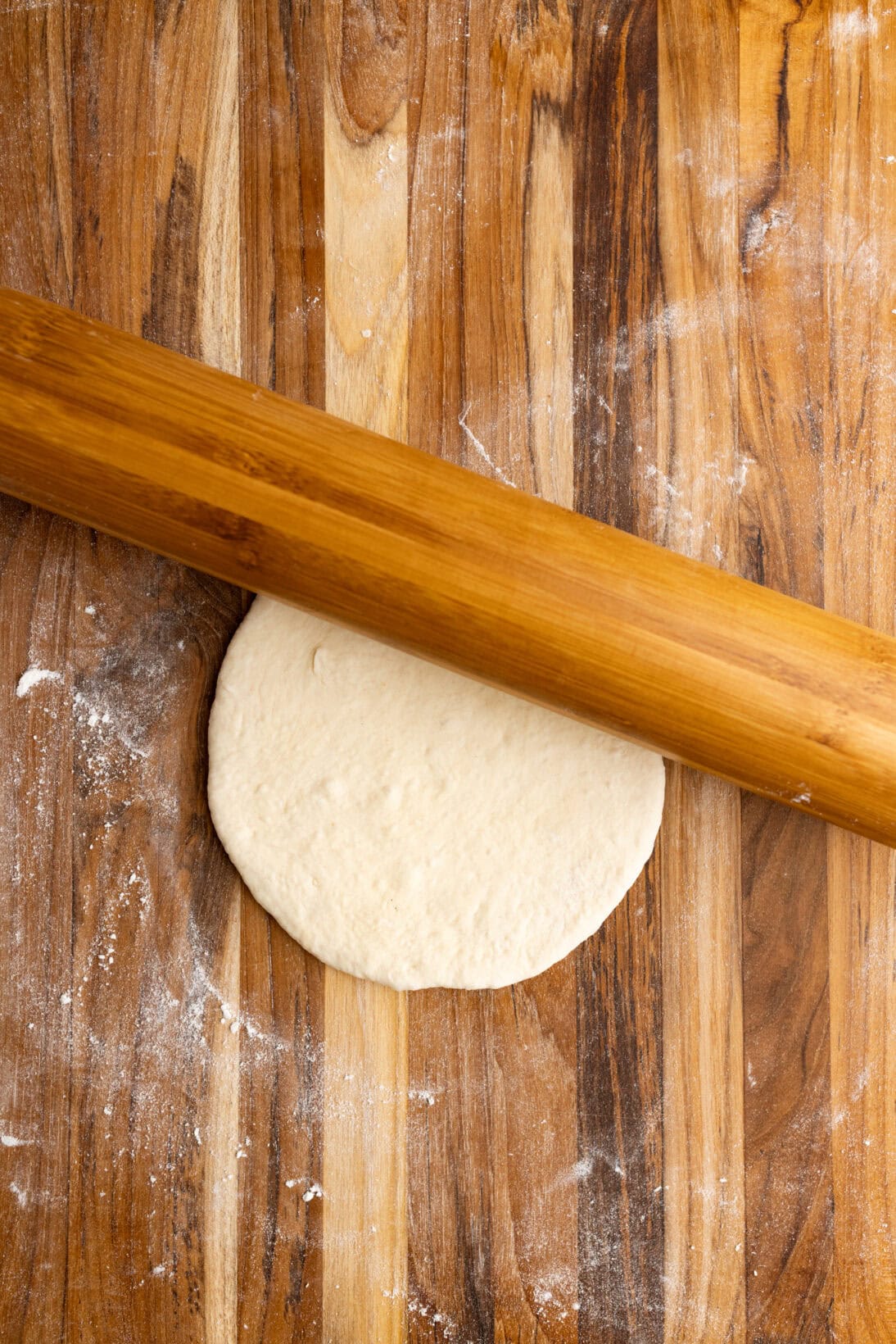 rolling out the dough ball