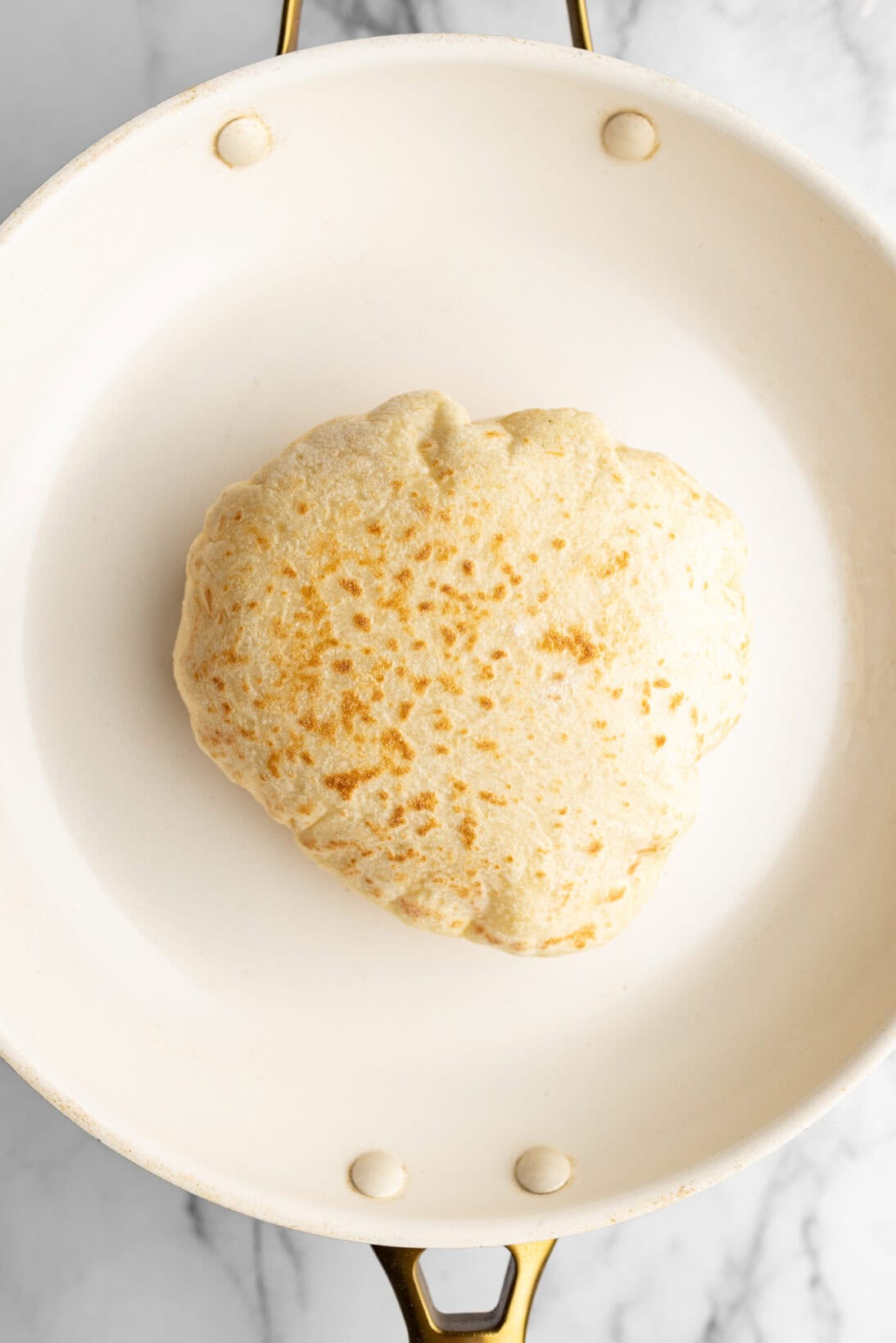 a successful puffed up pita bread.