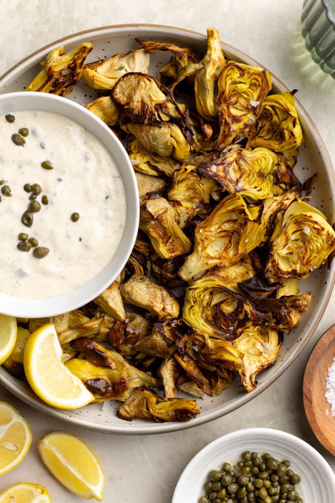 a bowl of crispy artichokes with a lemon caper aioli