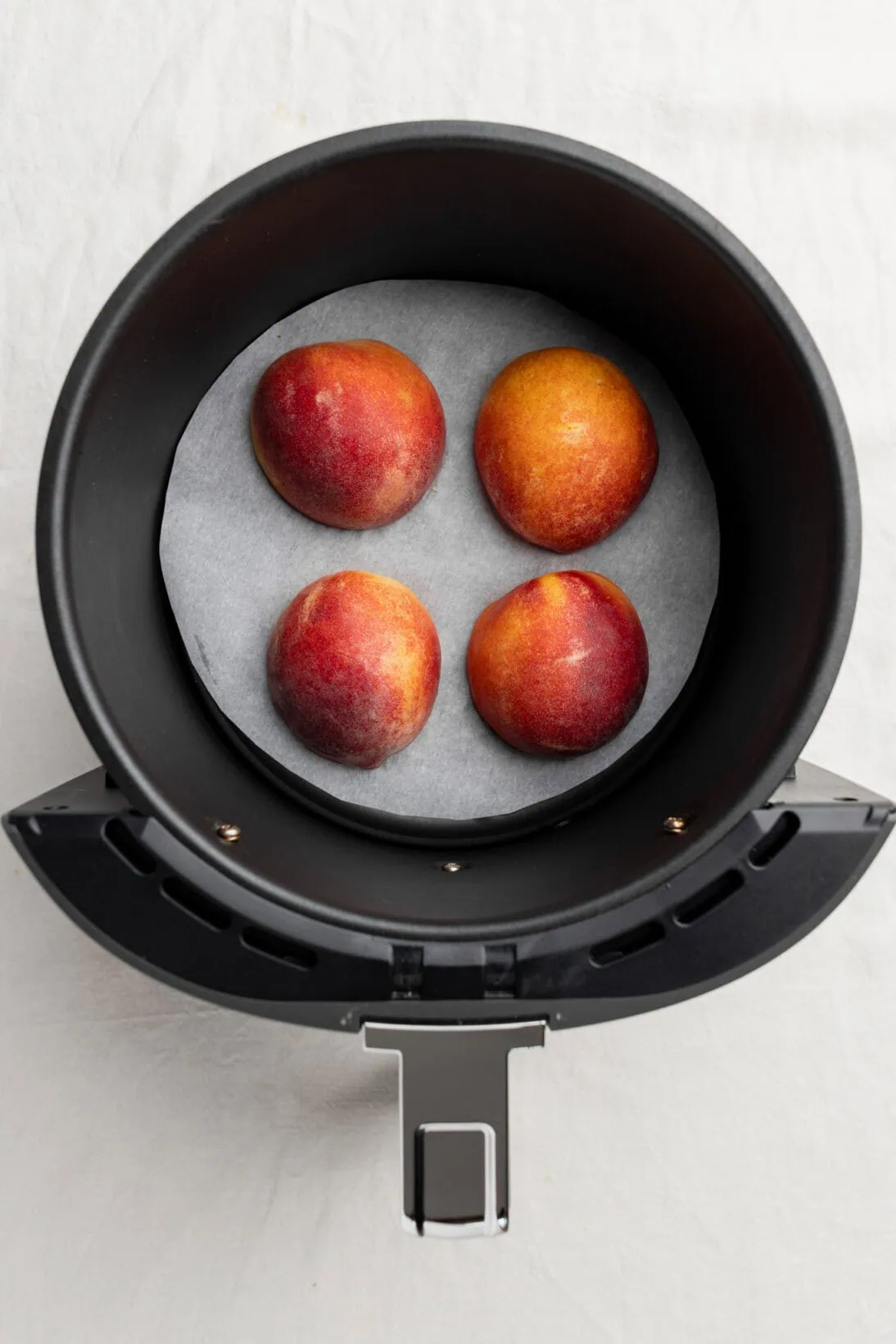 step 1: place the peaches in face down and cook for 3 minutes