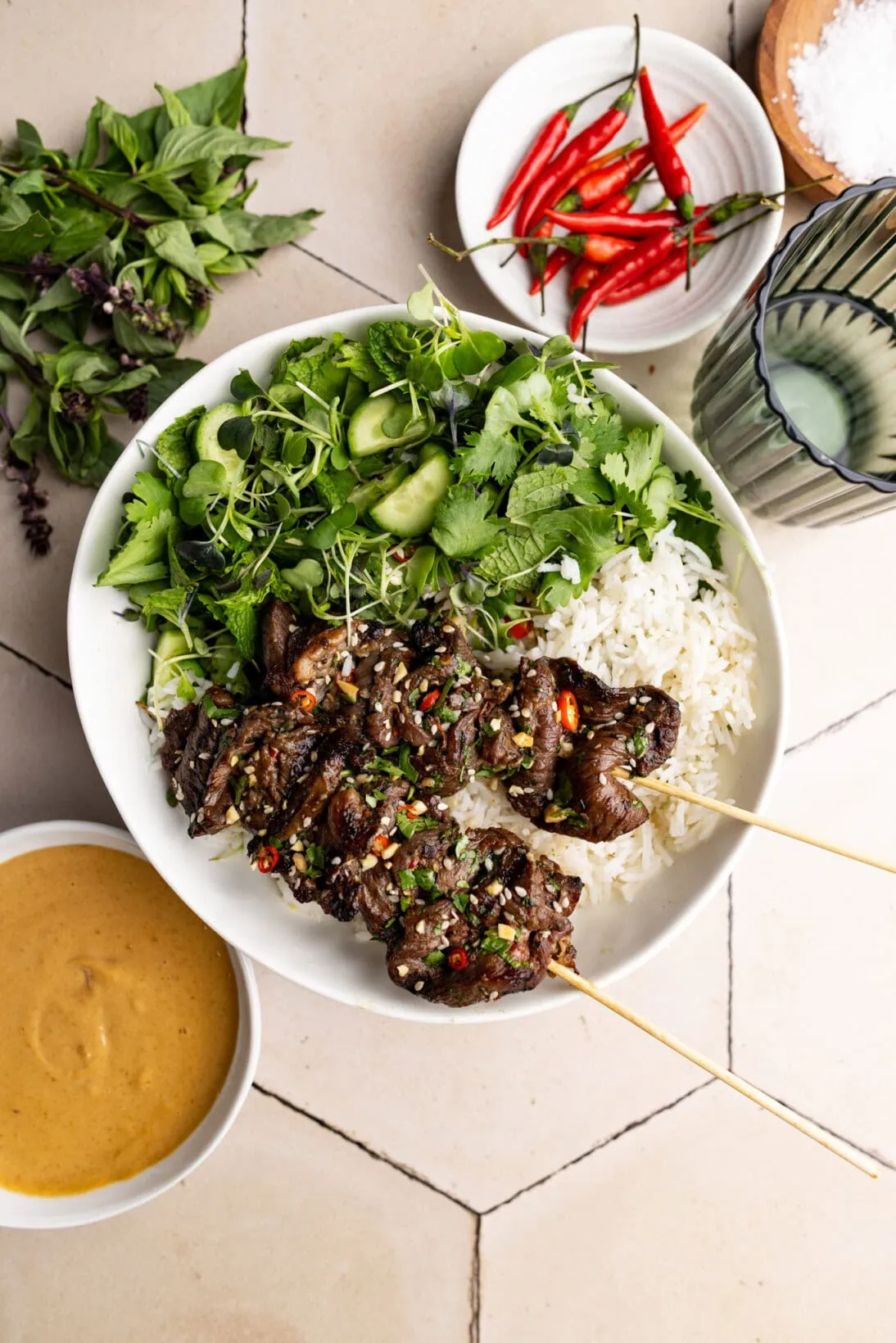 beef satay bowl with basmati rice and a microgreen salad