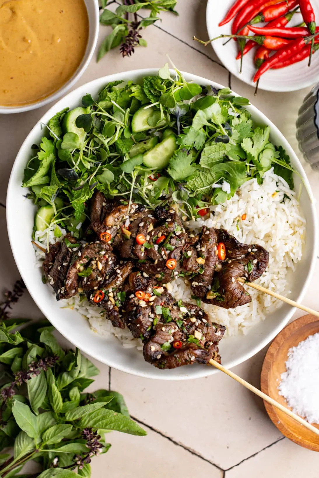 beef satay bowl with basmati rice and a microgreen salad