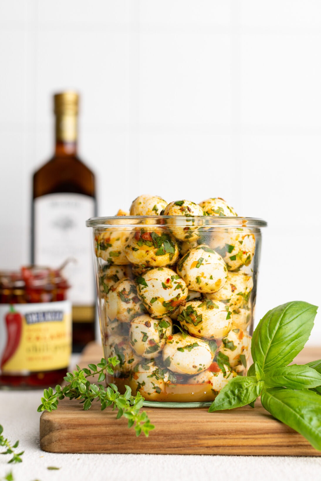 a jar of marinated mozzarella balls