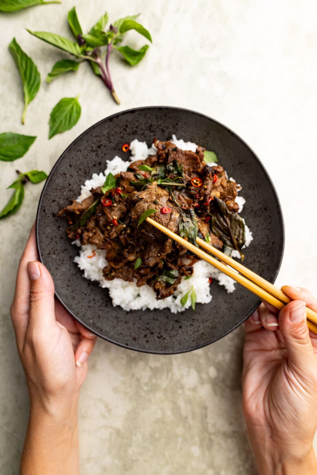 eating Thai basil beef. 