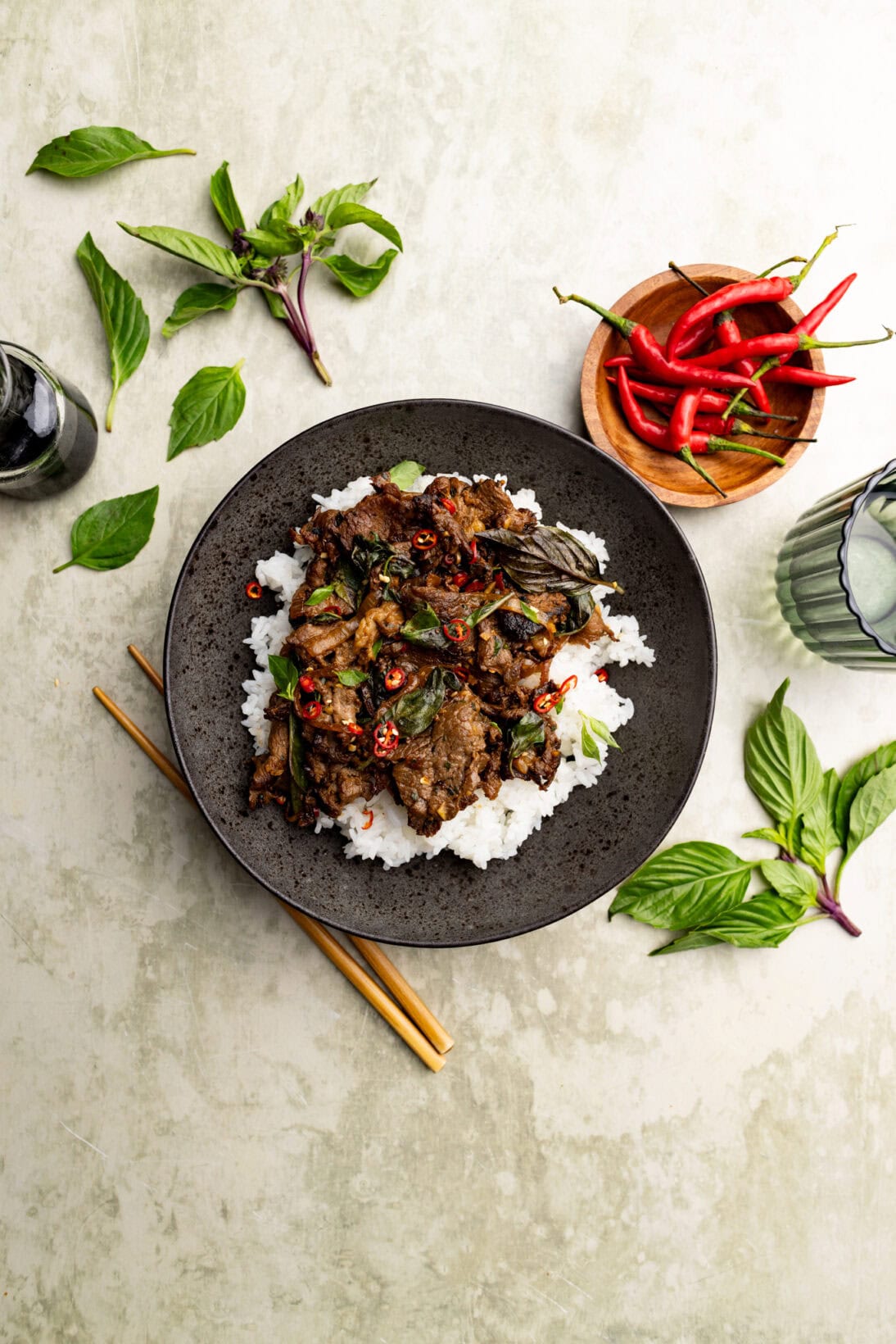 a bowl of Thai basil beef over white rice
