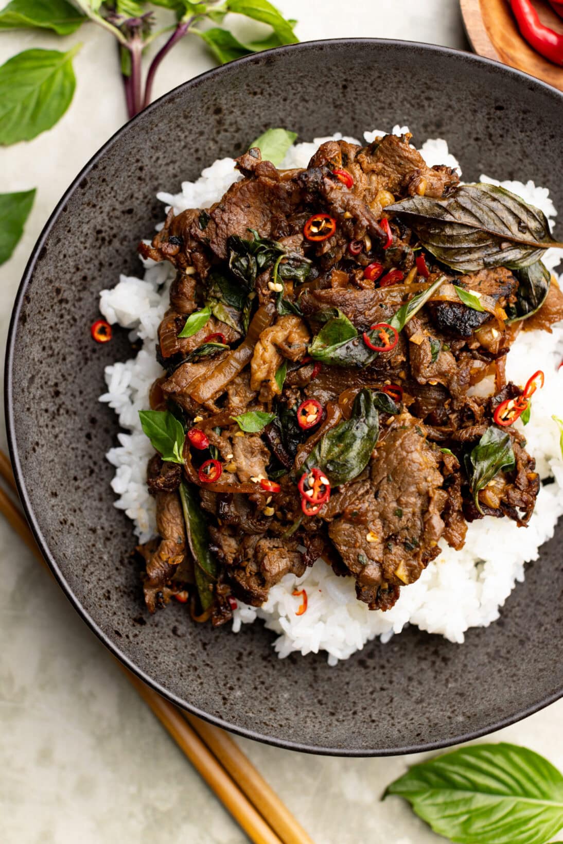 a bowl of Thai basil beef over white rice