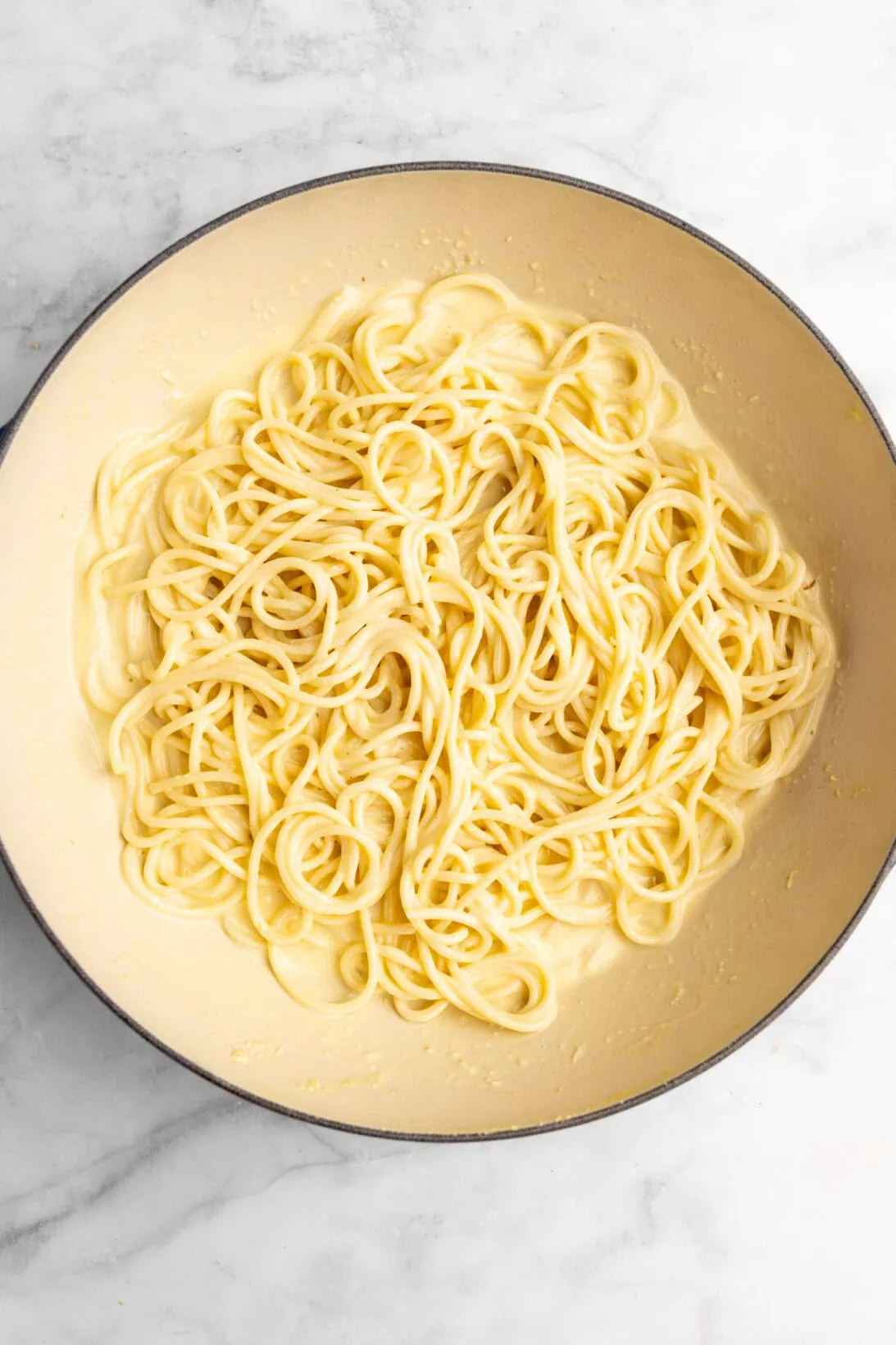 cheese and egg mixture emulsified, making the smoked gouda carbonara sauce.