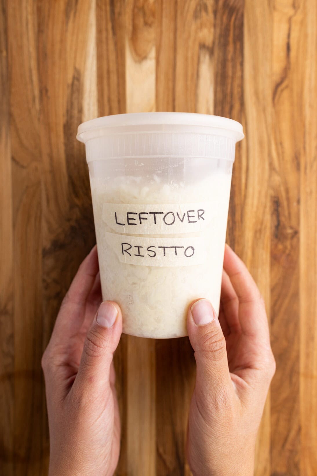 a quart takeout container of leftovers