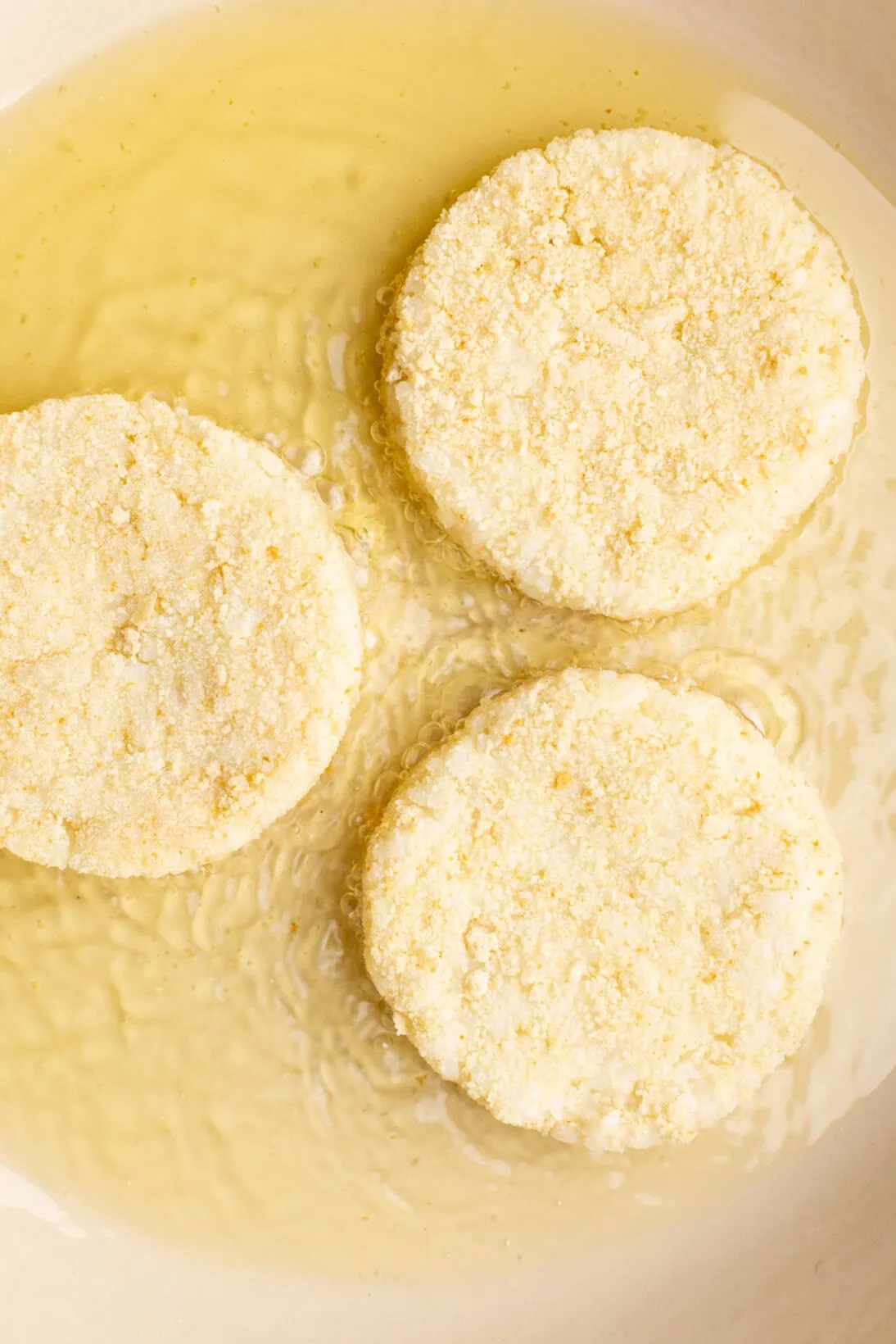 frying the risotto cakes