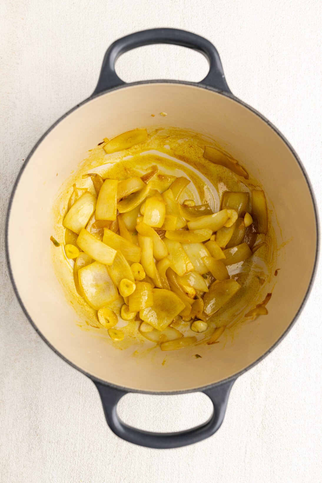 step by step: sautéing the onions, garlic in turmeric