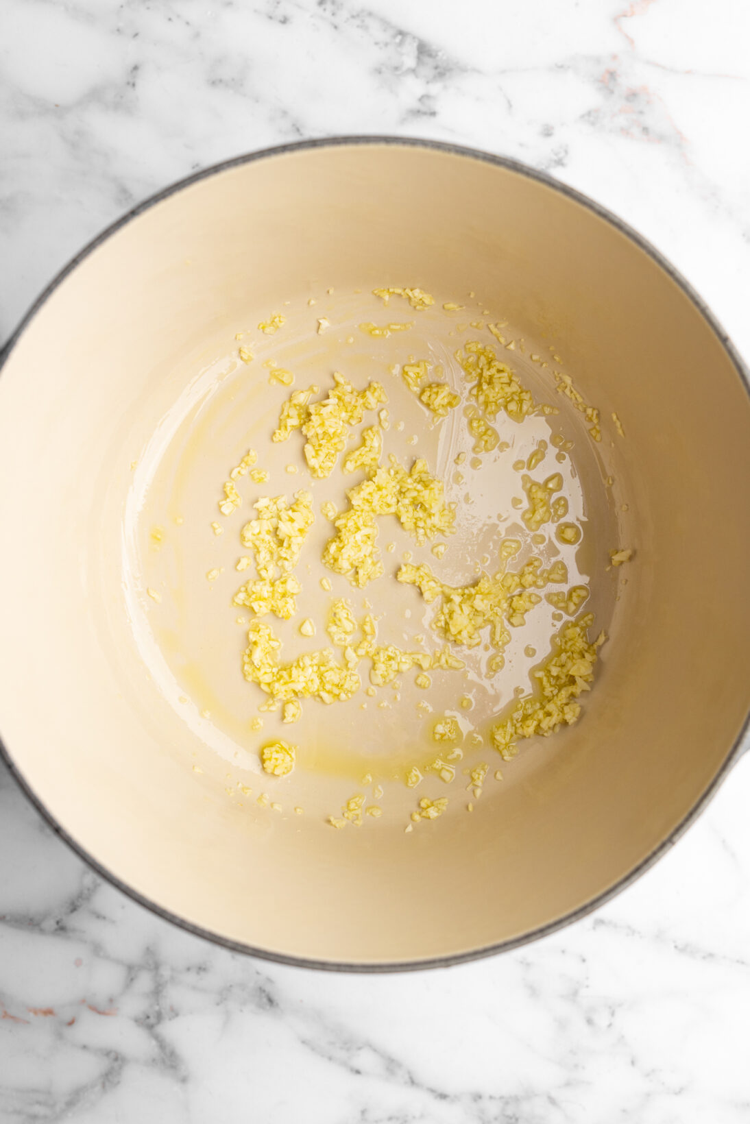 sautéing garlic in olive oil before adding in the broth and lemon juice
