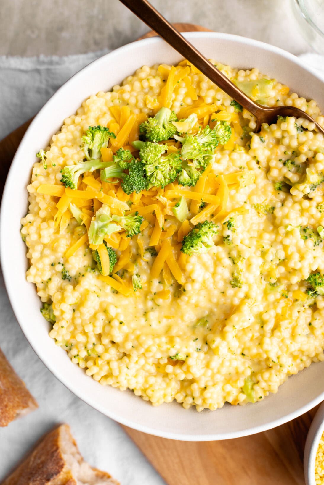 a bowl of broccoli cheddar pasta