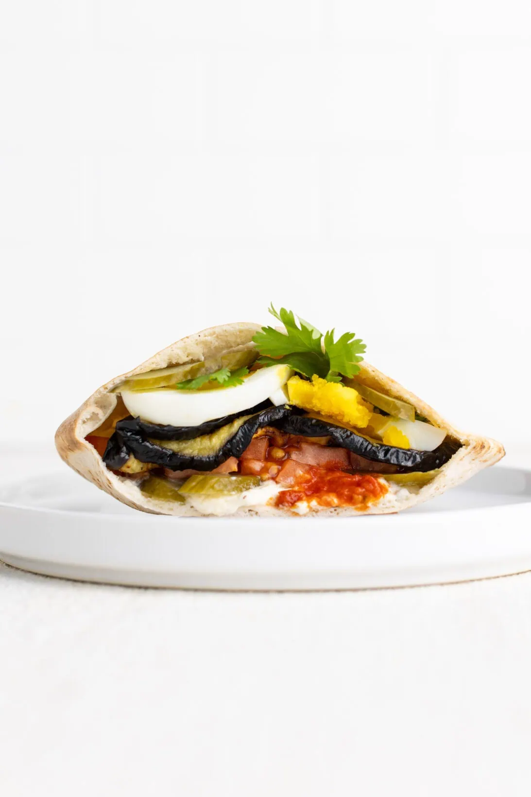 sabich sandwich on a plate