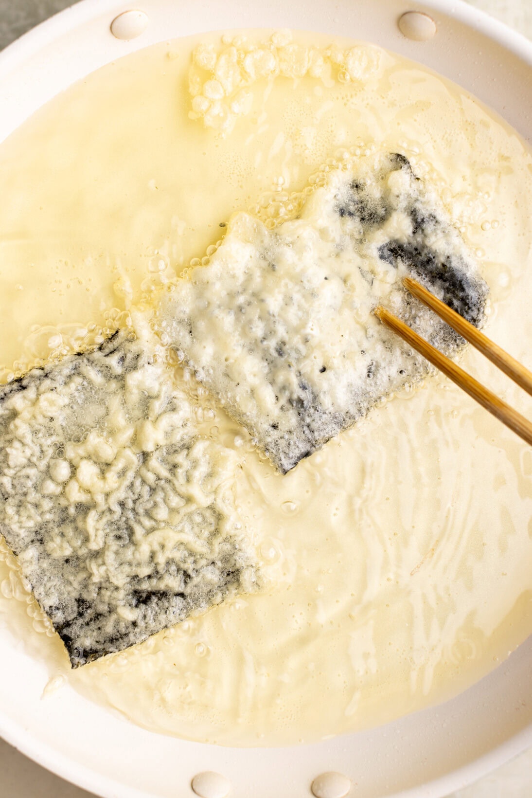 frying tempura coated nori