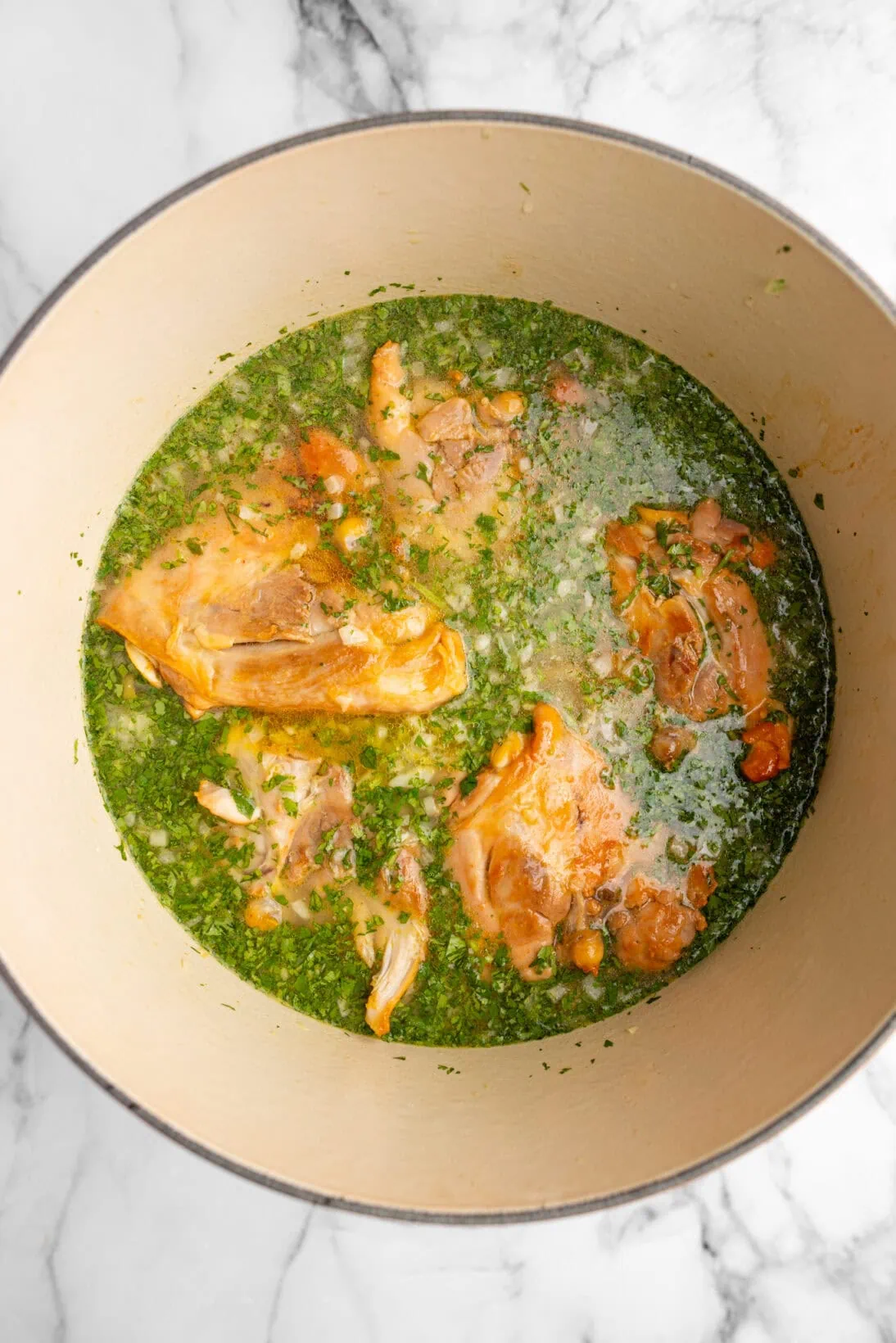 added the broth with the tomato chicken bouillon