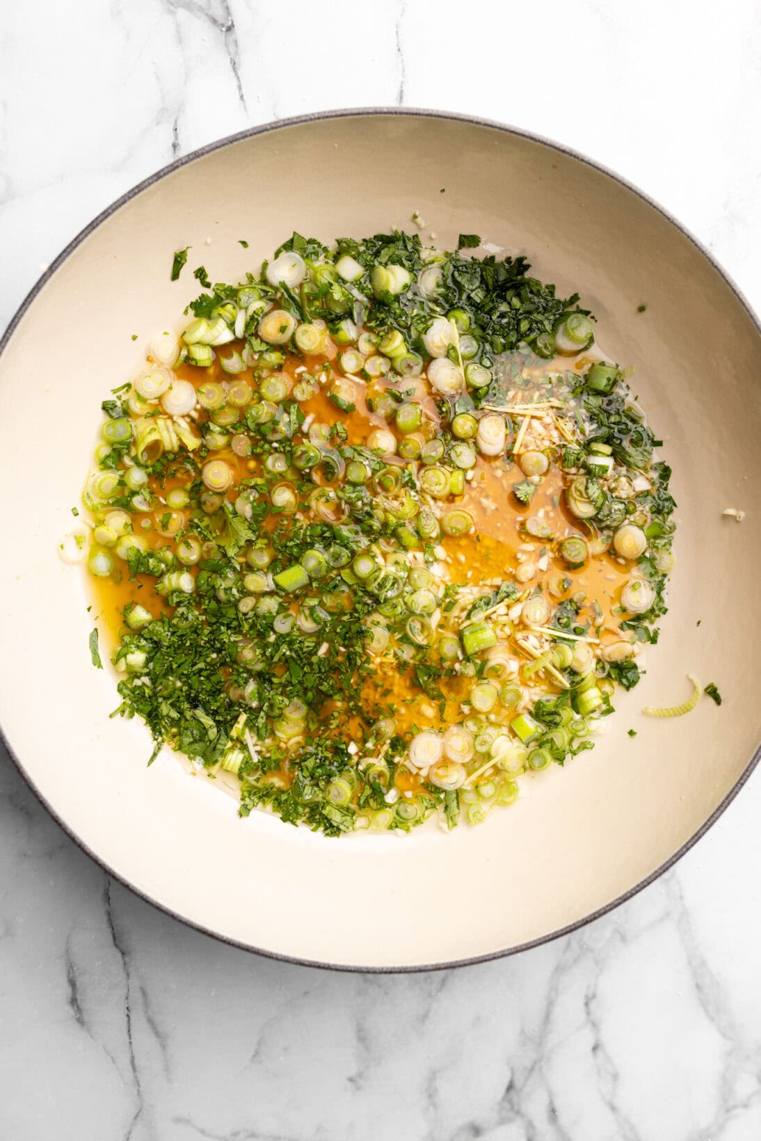 step by step: adding the the contents of the sauce