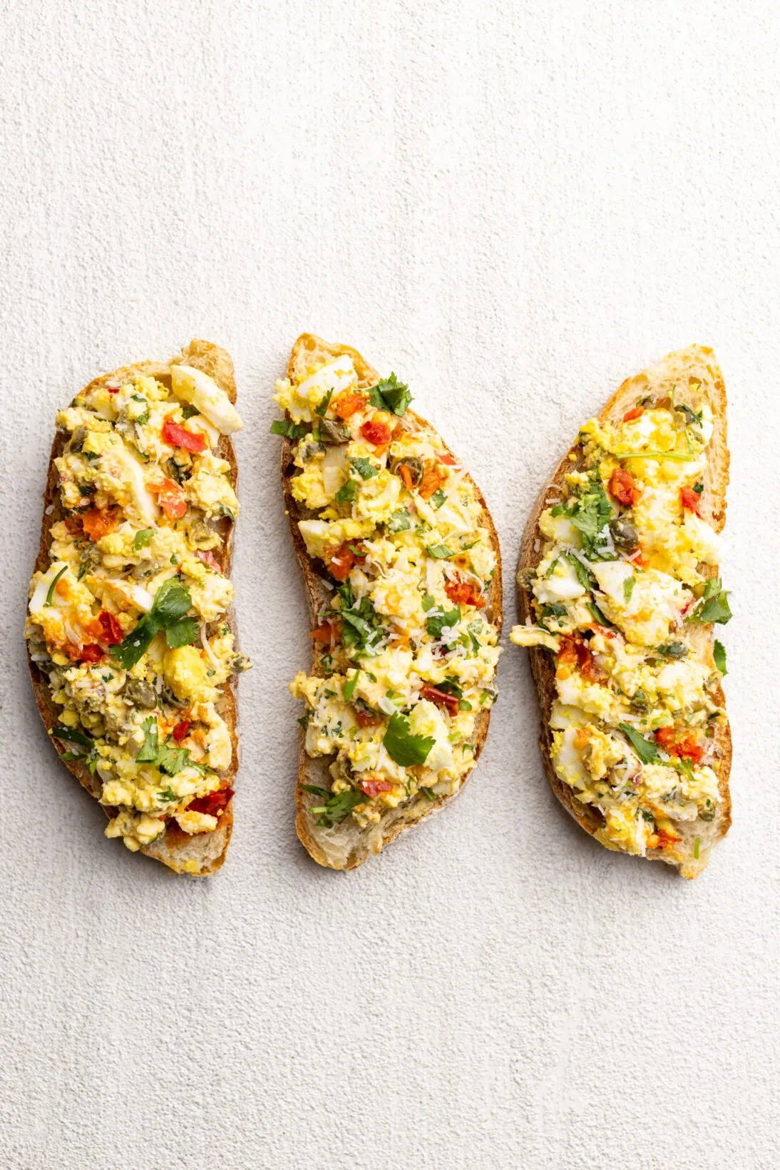 spicy egg salad on crusty crostini's