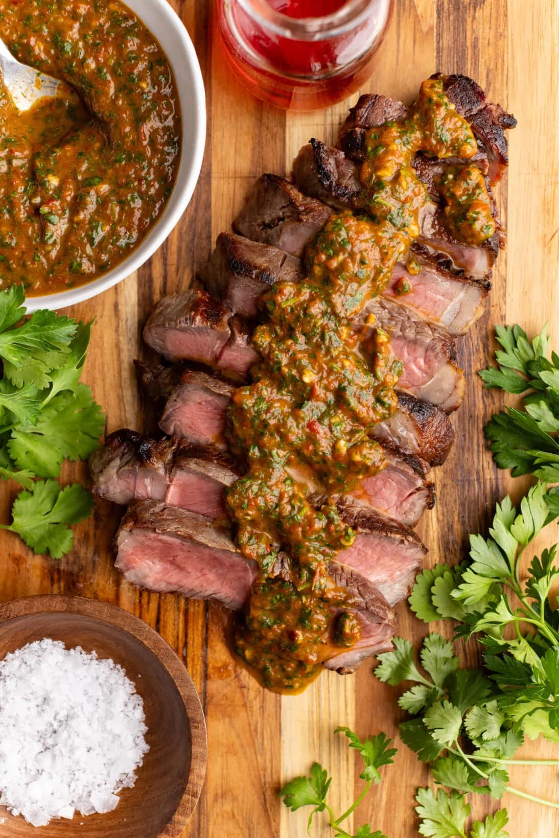 steak covered in red chimichurri
