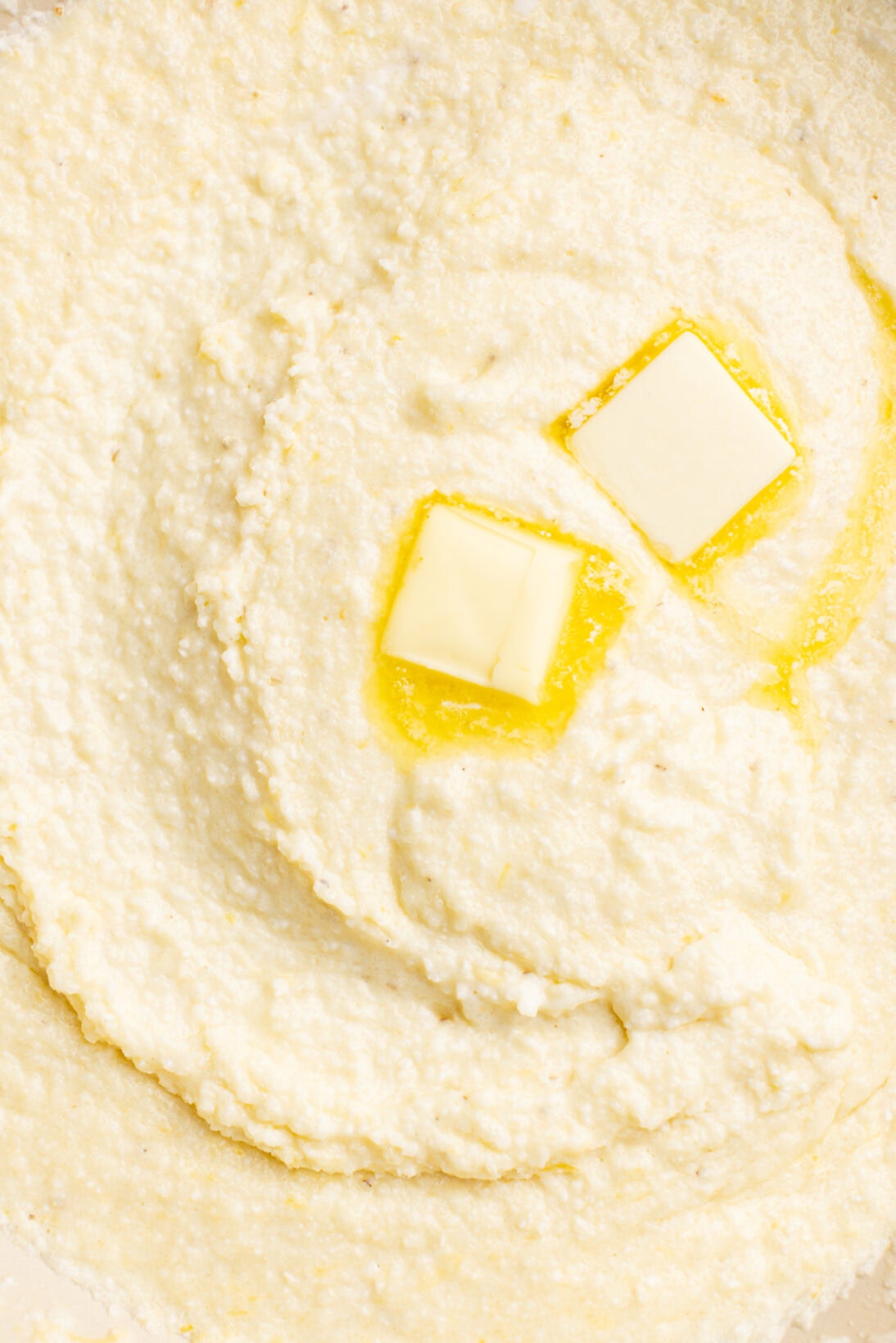 creamy grits with slabs of butter