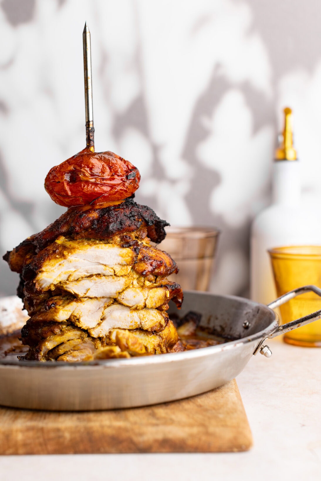 shaved shawarma chicken on the spit