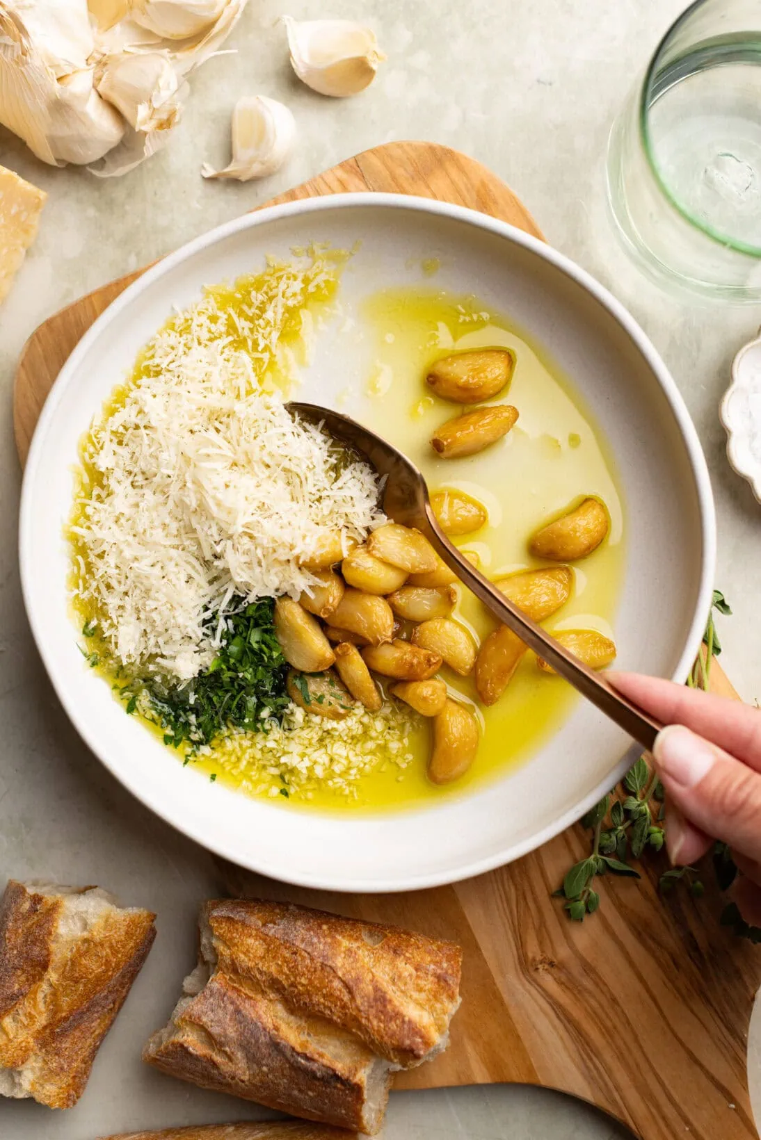 garlic bread dipping oil ( garlic confit, parm, parsley, and raw garlic) in a bowl.