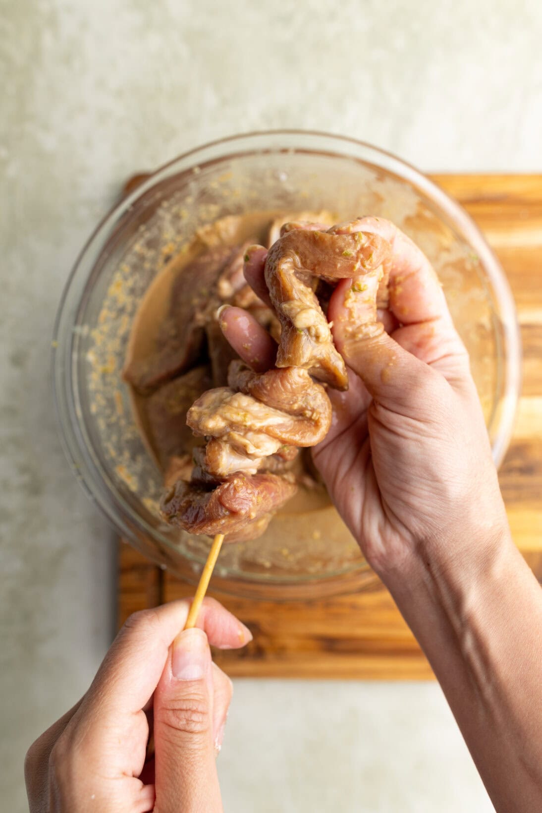 step by step: skewering the moo ping.