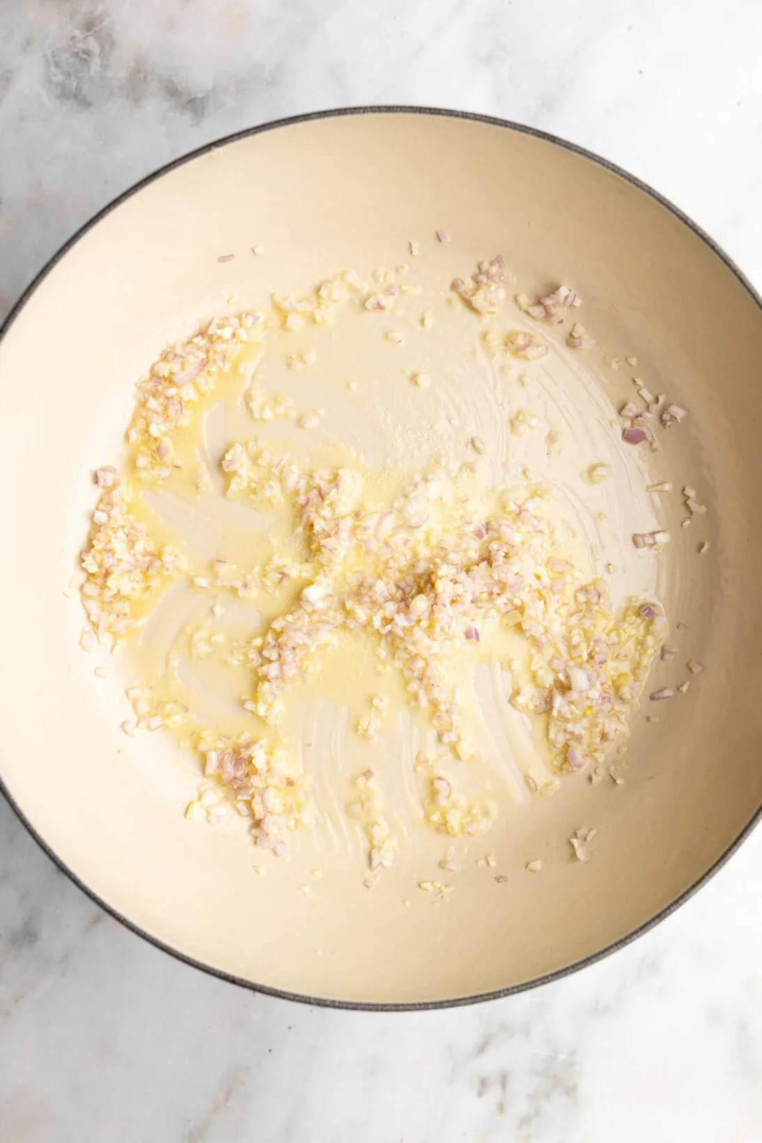 Step by step: sautéing the base (shallots and garlic)