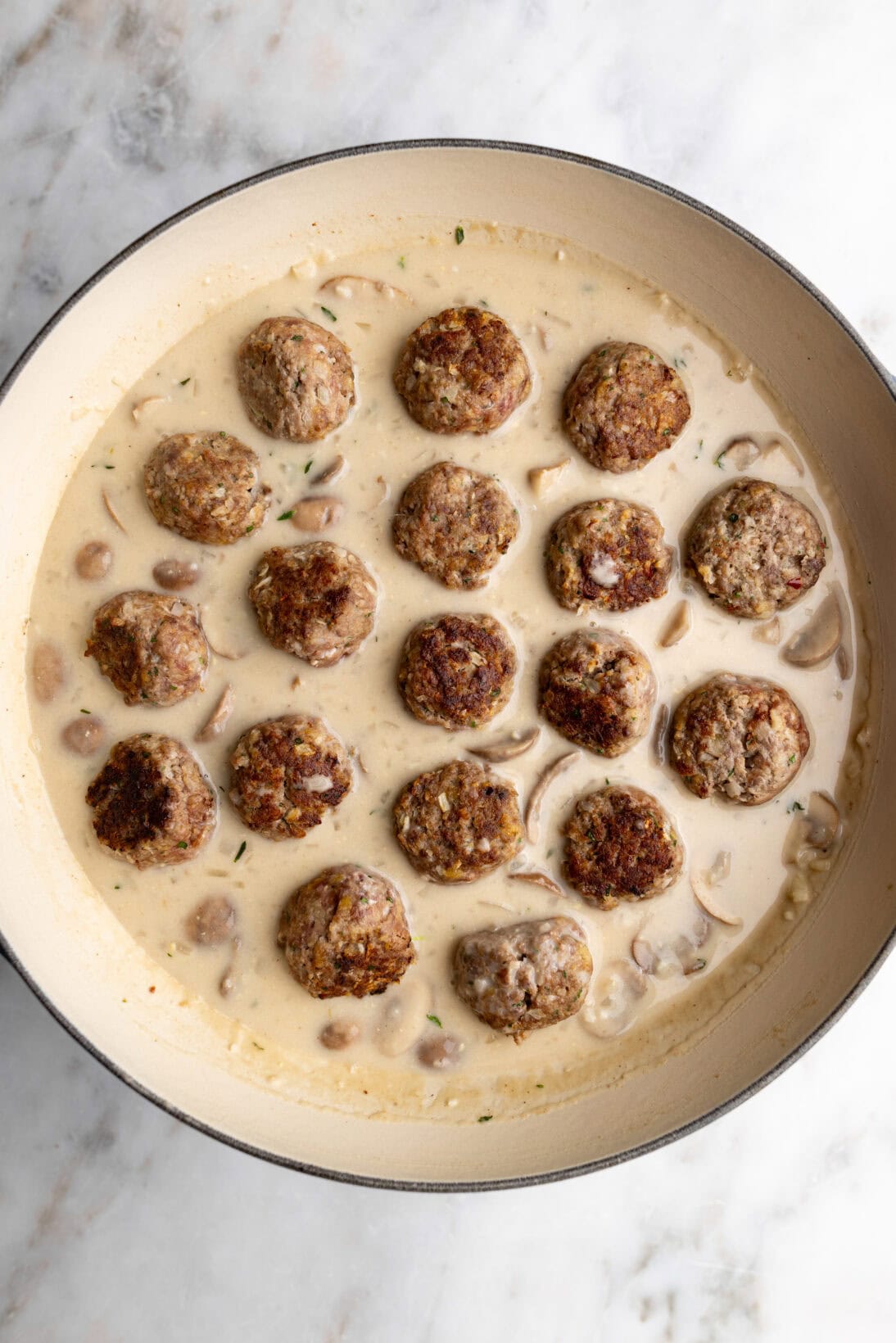 step by step: simmering the meatballs.