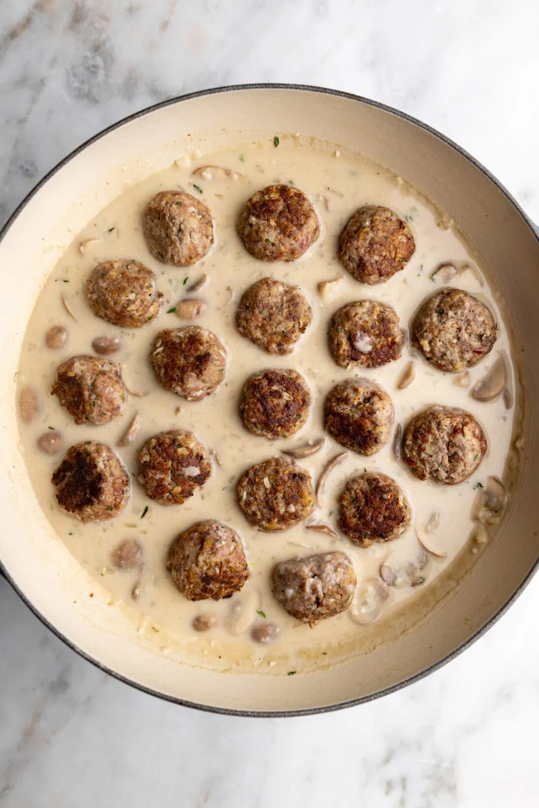 step by step: simmering the meatballs.